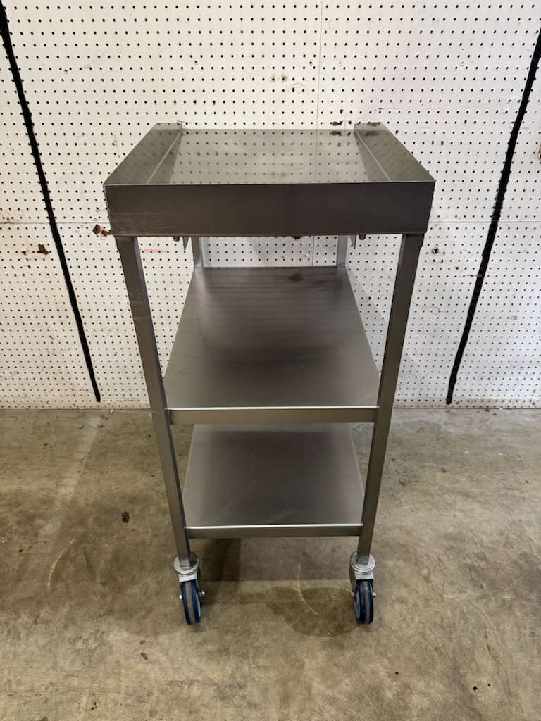 Used 18"x30" Stainless Steel Table with 3" Backsplash, Shelves and Casters