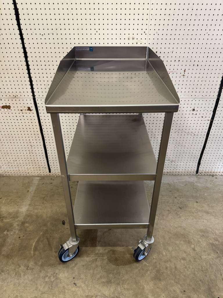 Used 18"x30" Stainless Steel Table with 3" Backsplash, Shelves and Casters