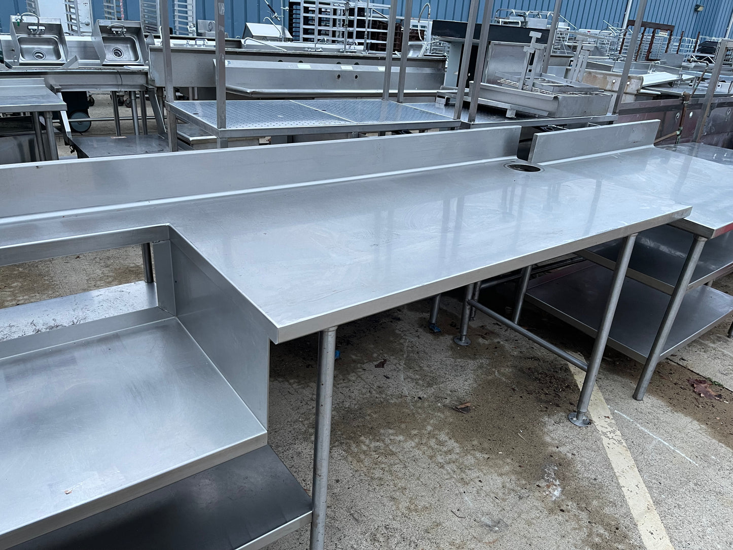 Used 130" Stainless Steel Table with Shelves and Small Sink Area - SS13