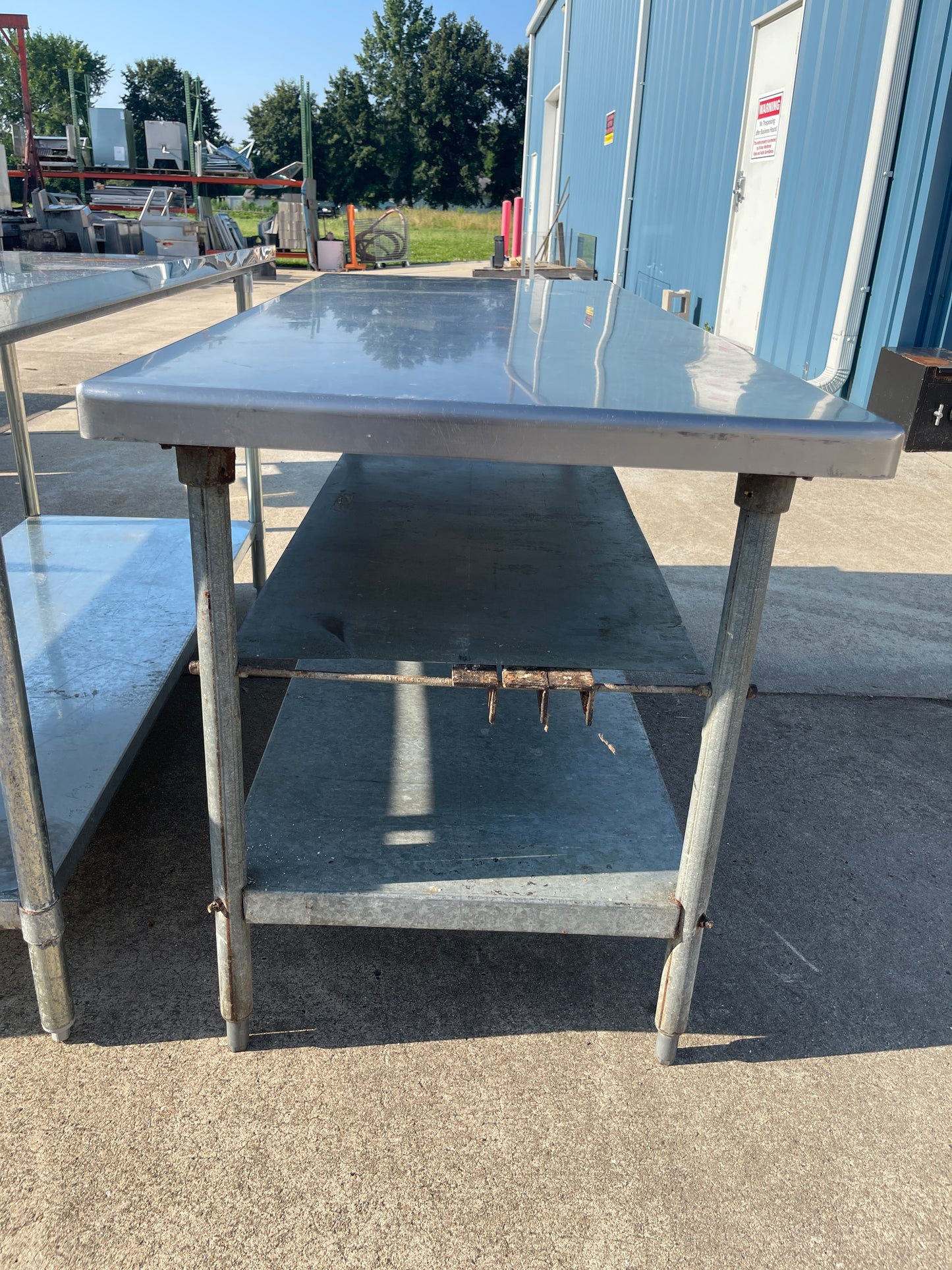 Used 72" Stainless Steel Table with 2 Shelves - SS317