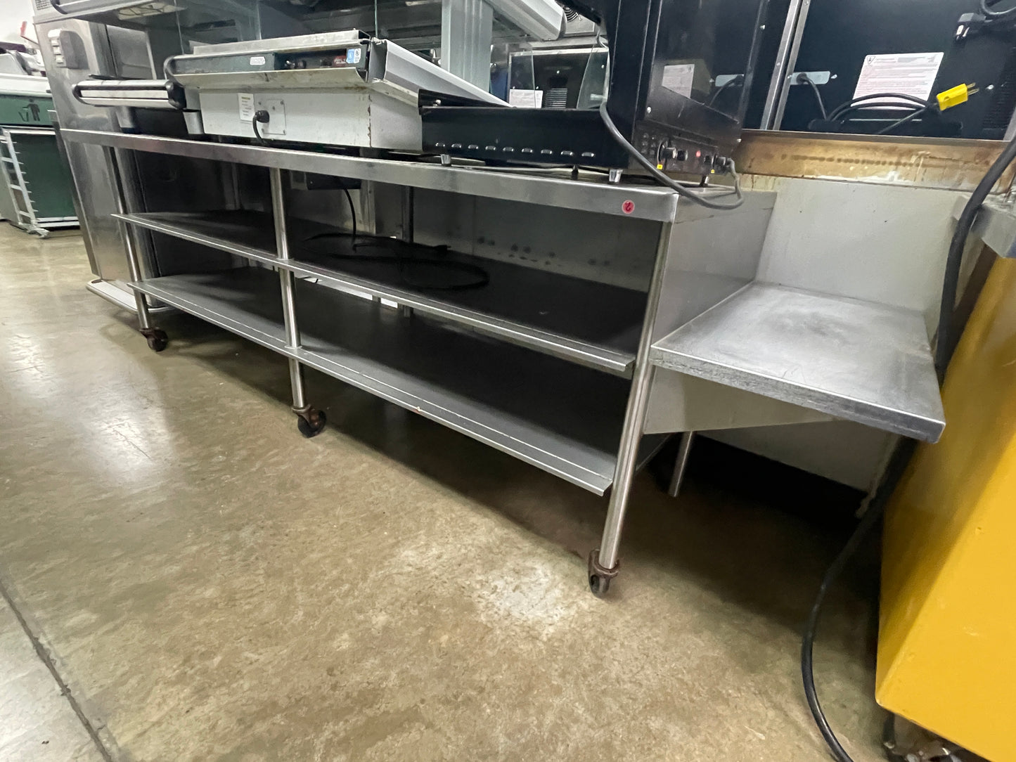 Used 108" Stainless Steel Heated Top Table with Casters