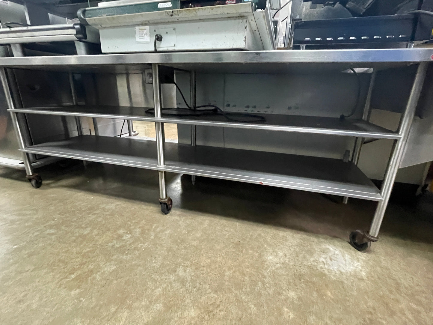 Used 108" Stainless Steel Heated Top Table with Casters
