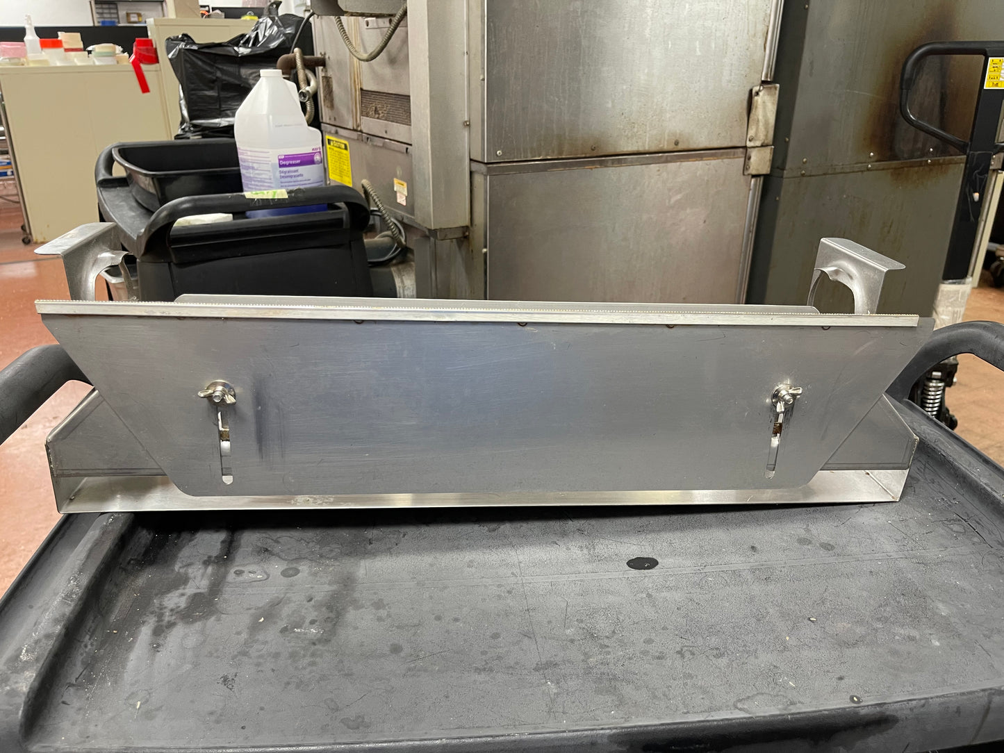 Used Miler stainless steel Miler Wrap Dispenser 24”