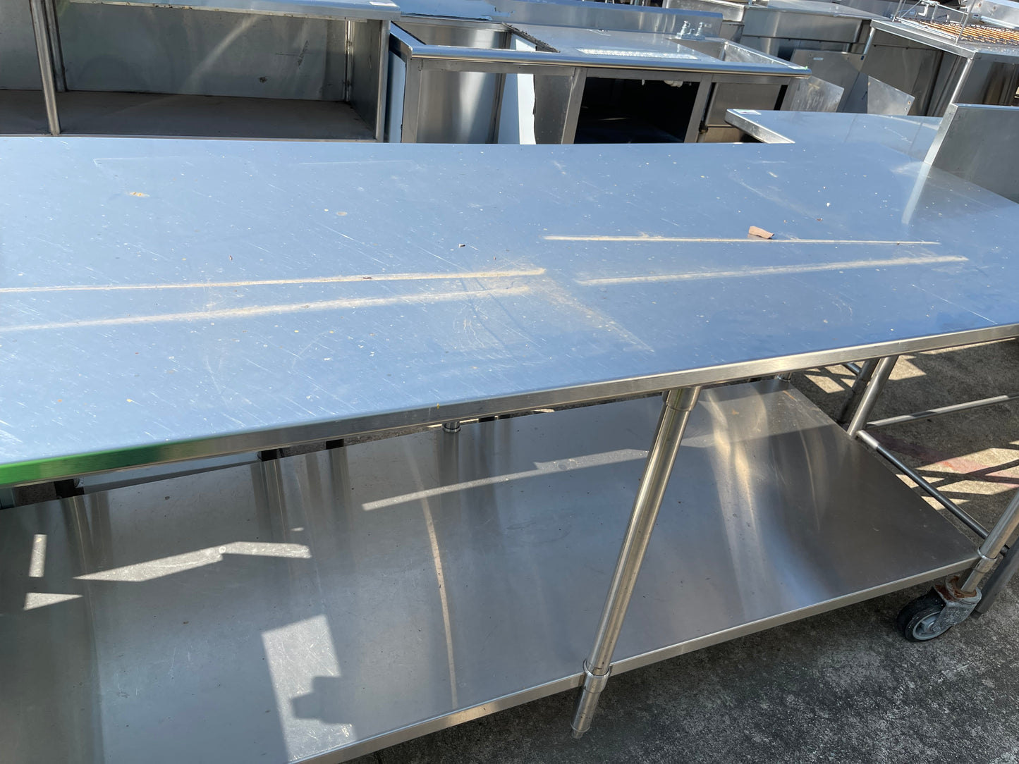 Used 96" Stainless Steel Table with Caster Wheels - SS114