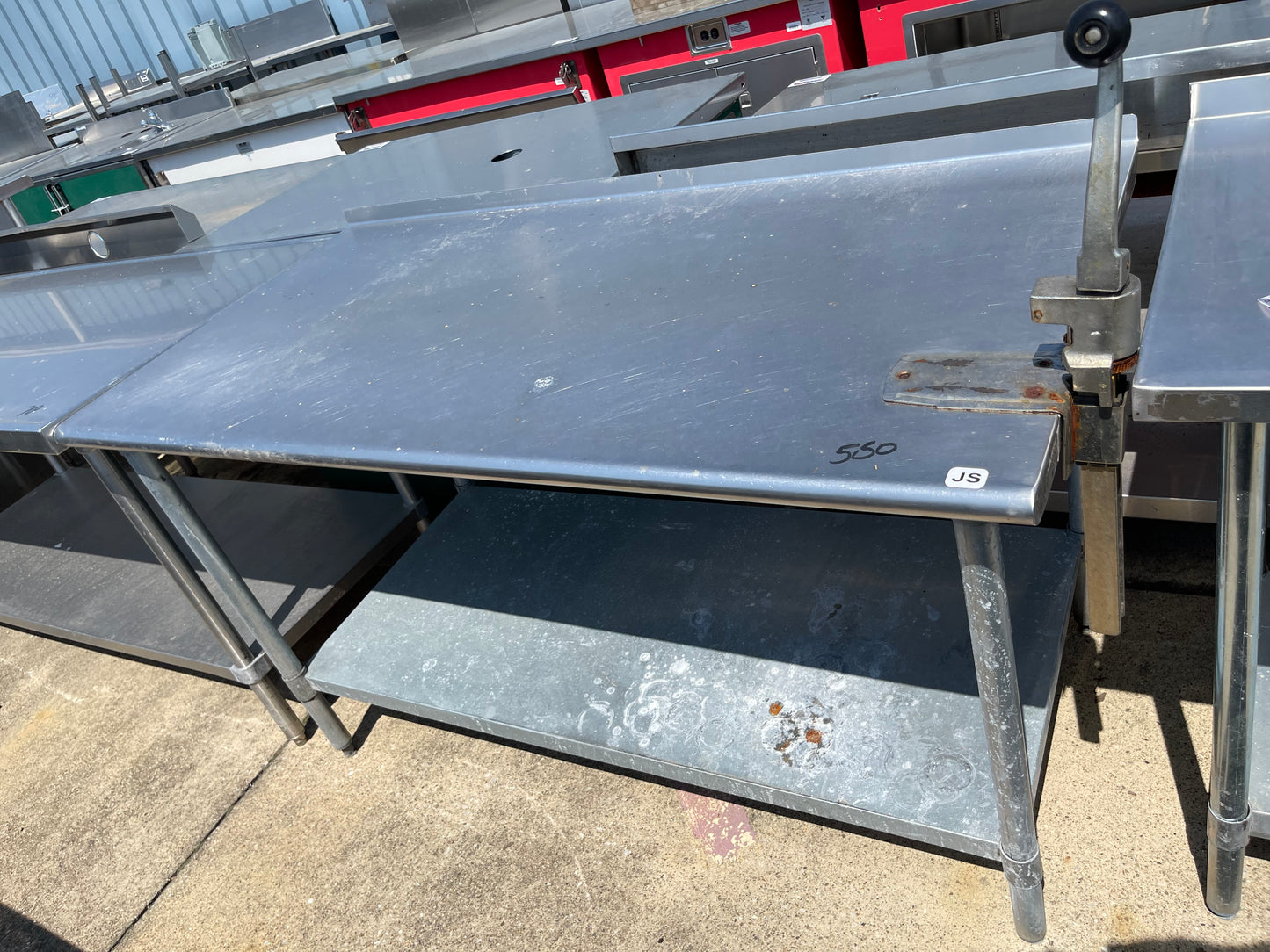 Used 60" Stainless Steel Table with a 1" Backsplash - JS - SS129