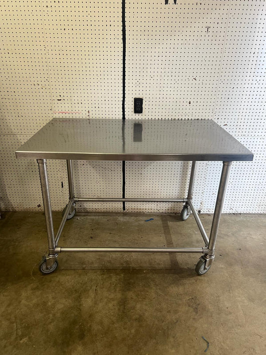 Used 48" X 30" Stainless Steel Table with Casters - WO1