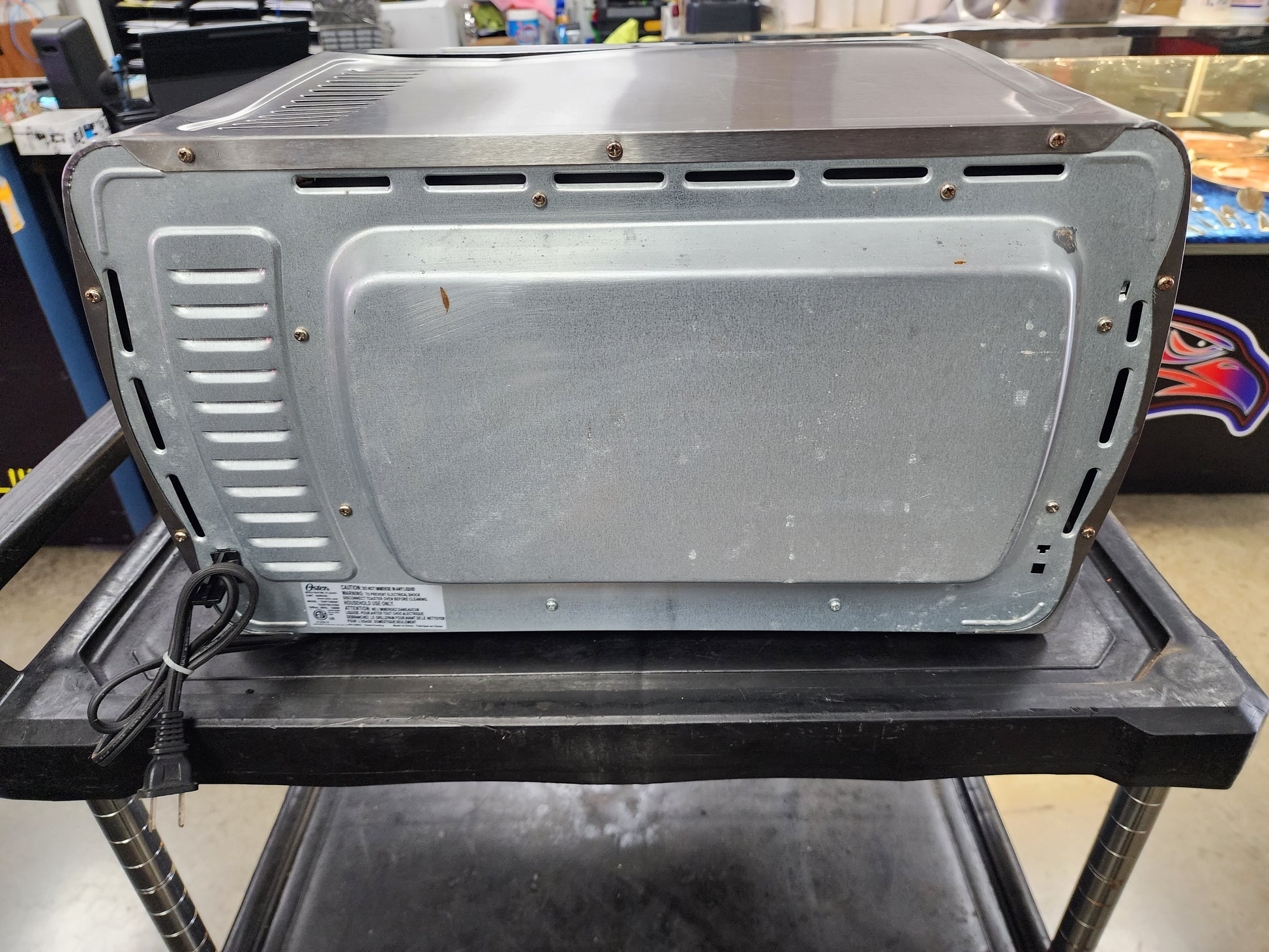 Oster TSSTTVSKBT-053 220 Volt Extra Large 6-Slice Convection Toaster Oven