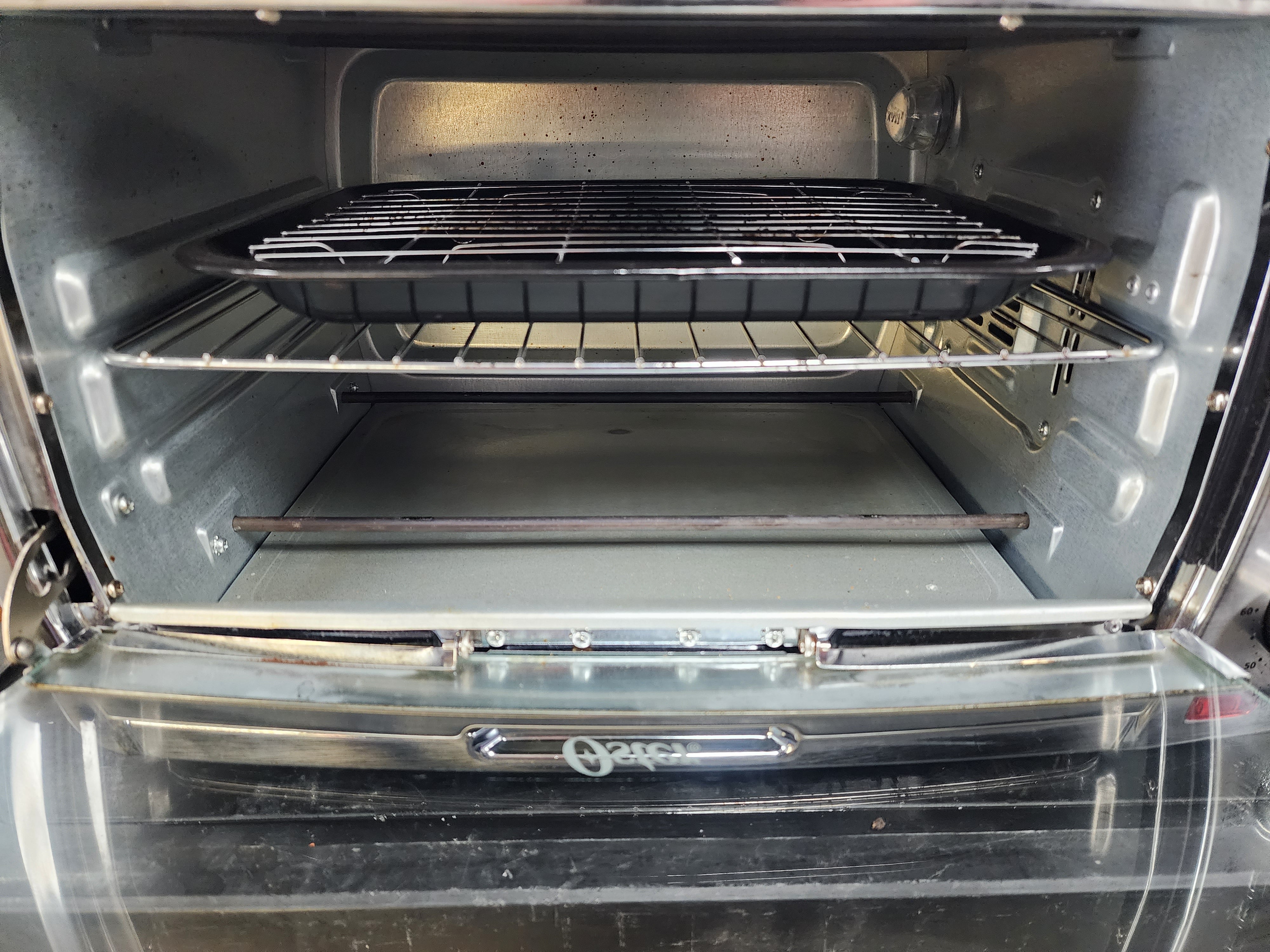 Oster brushed stainless steel countertop oven with outlet convection