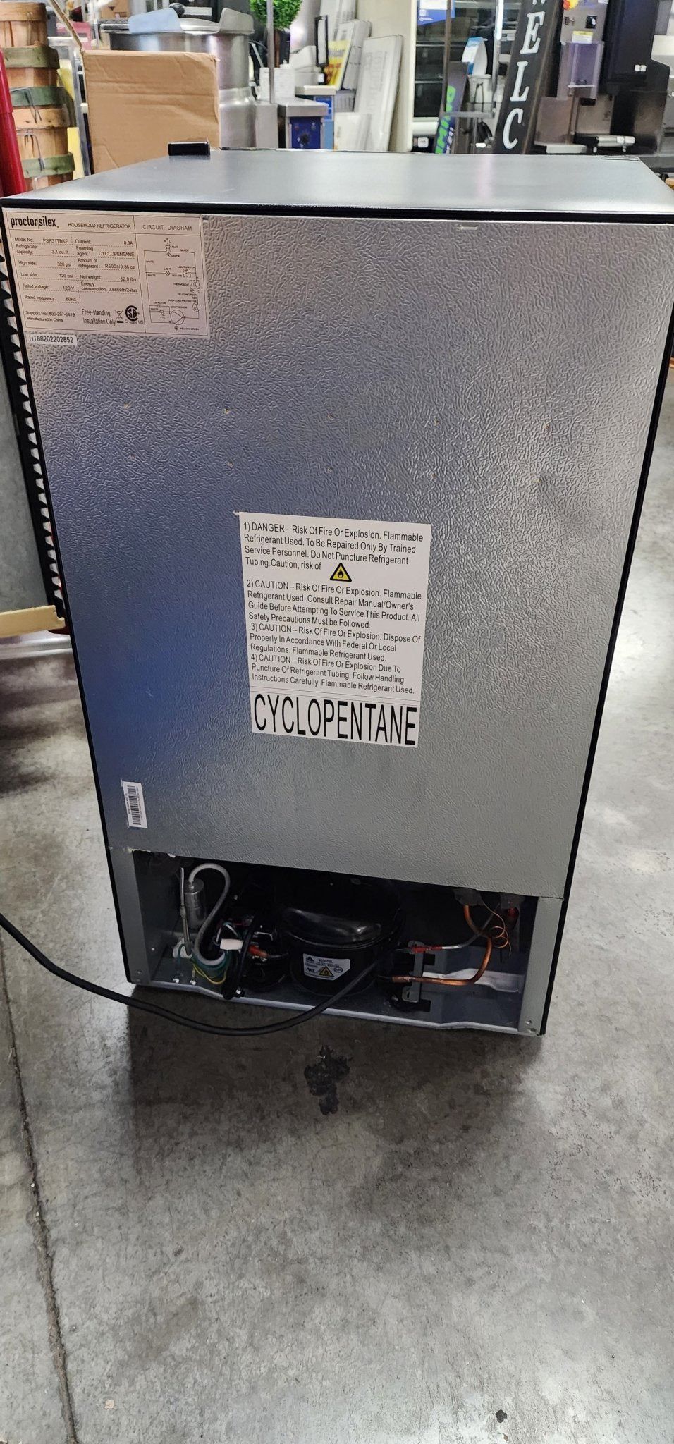 Used Proctor|Silex PSR31TBKE Compact Refrigerator w/ Reversible Double Door Top Mounted Freezer, 3.1 Cubic Feet, Black 120V - Falcon Restaurant Supply - 3