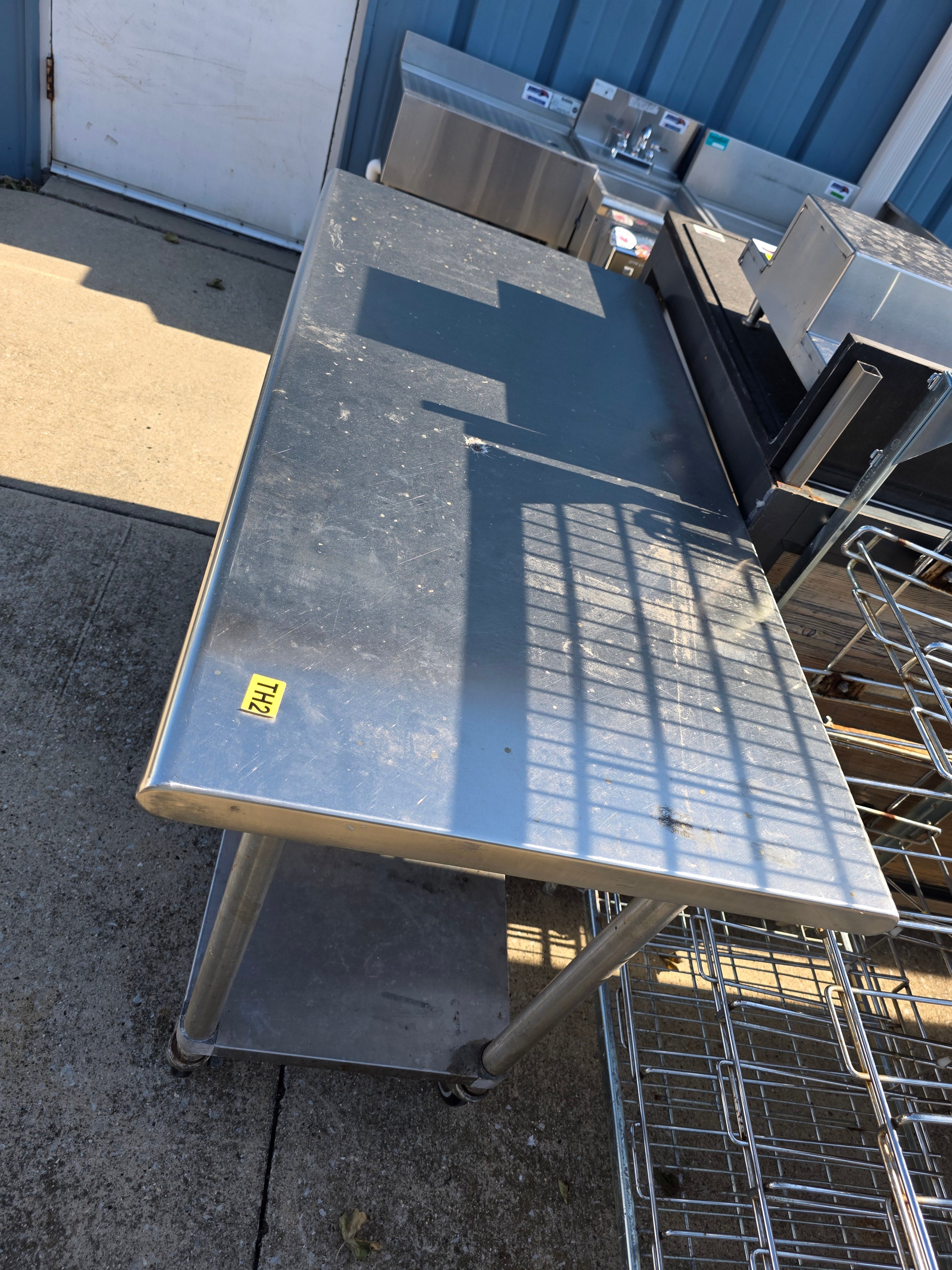 Used 48"X 24" Stainless Steel Table with Casters - TH2 - SS378