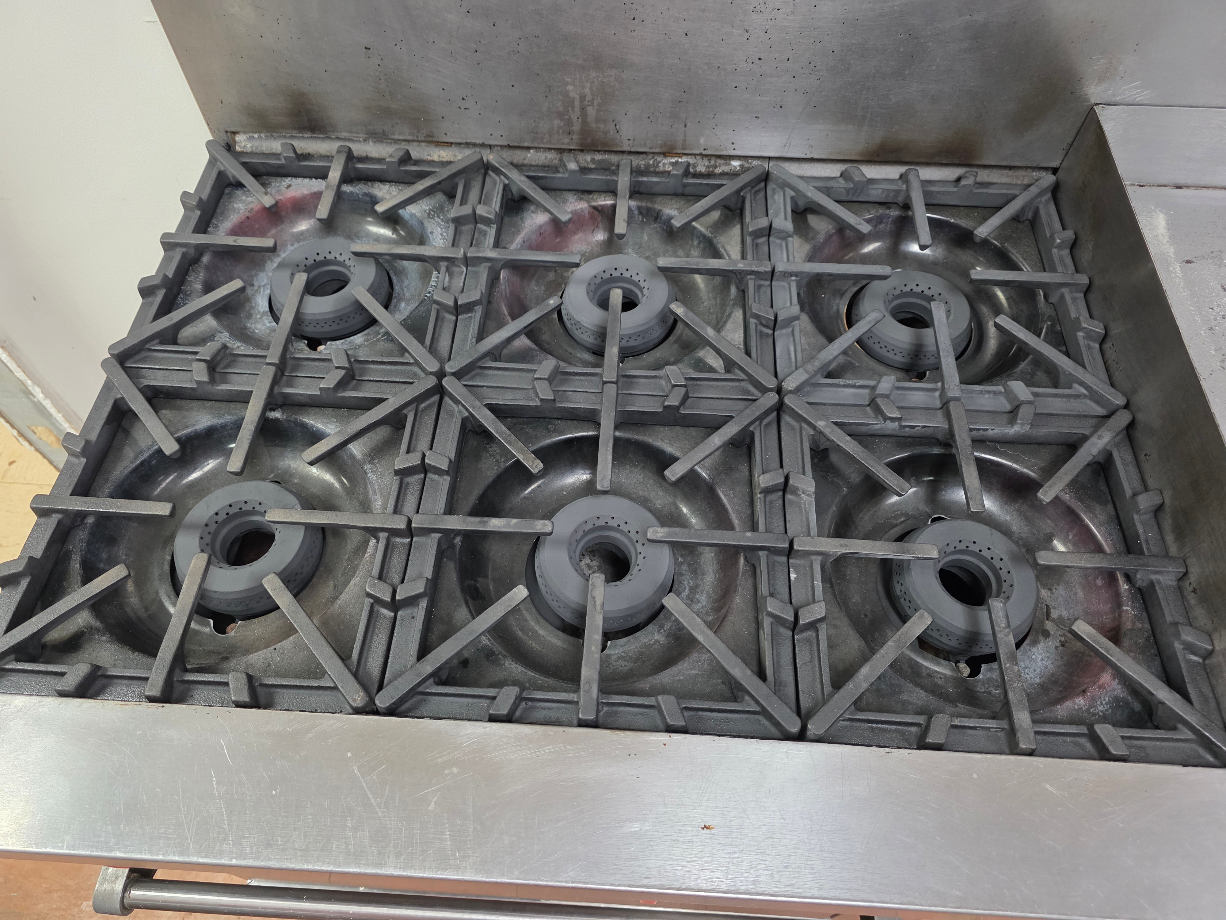 Used Vulcan 60-FTL 6 Burner NG Range with 24" Griddle and 2 Ovens