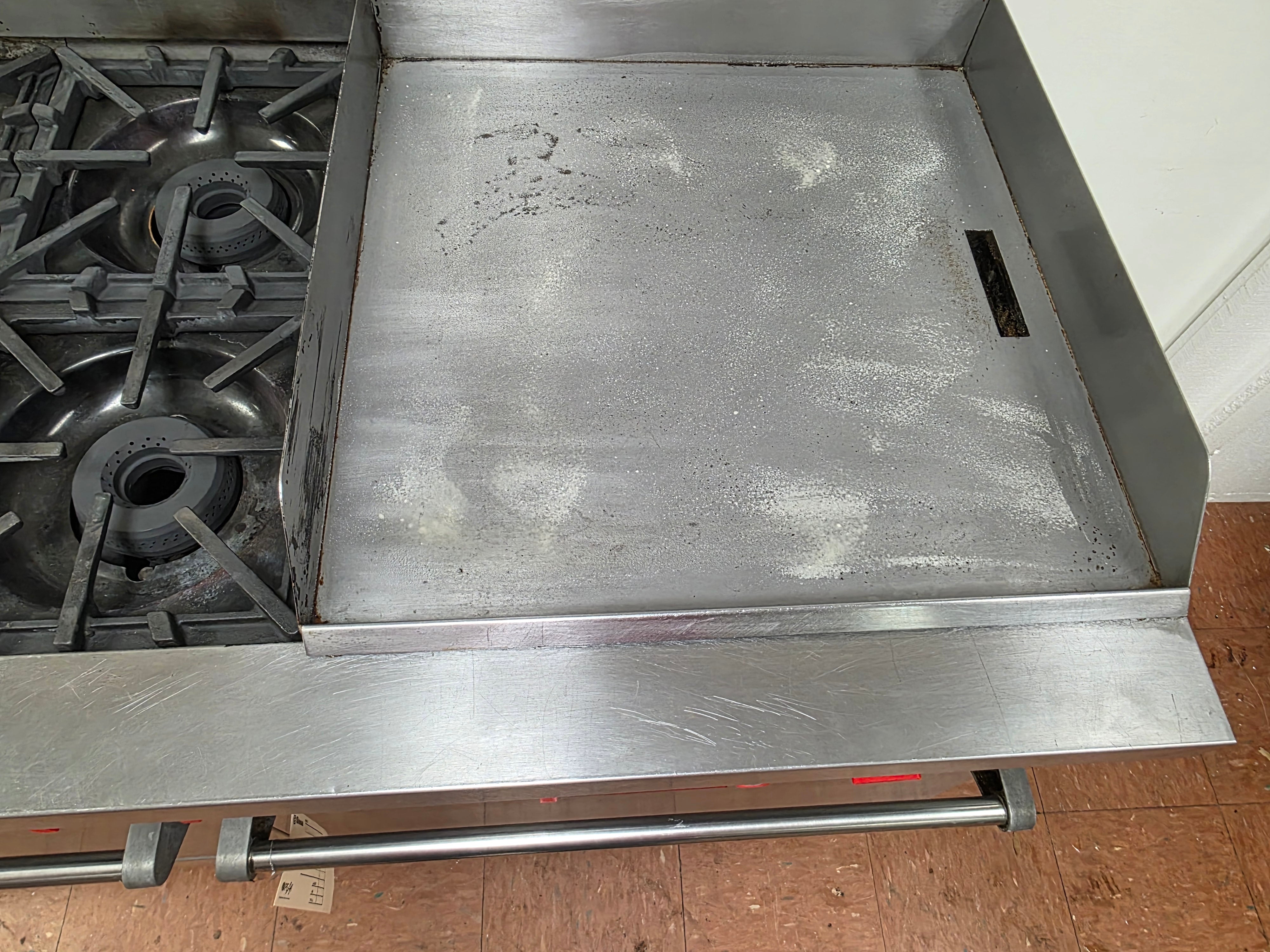 Used Vulcan 60-FTL 6 Burner NG Range with 24" Griddle and 2 Ovens