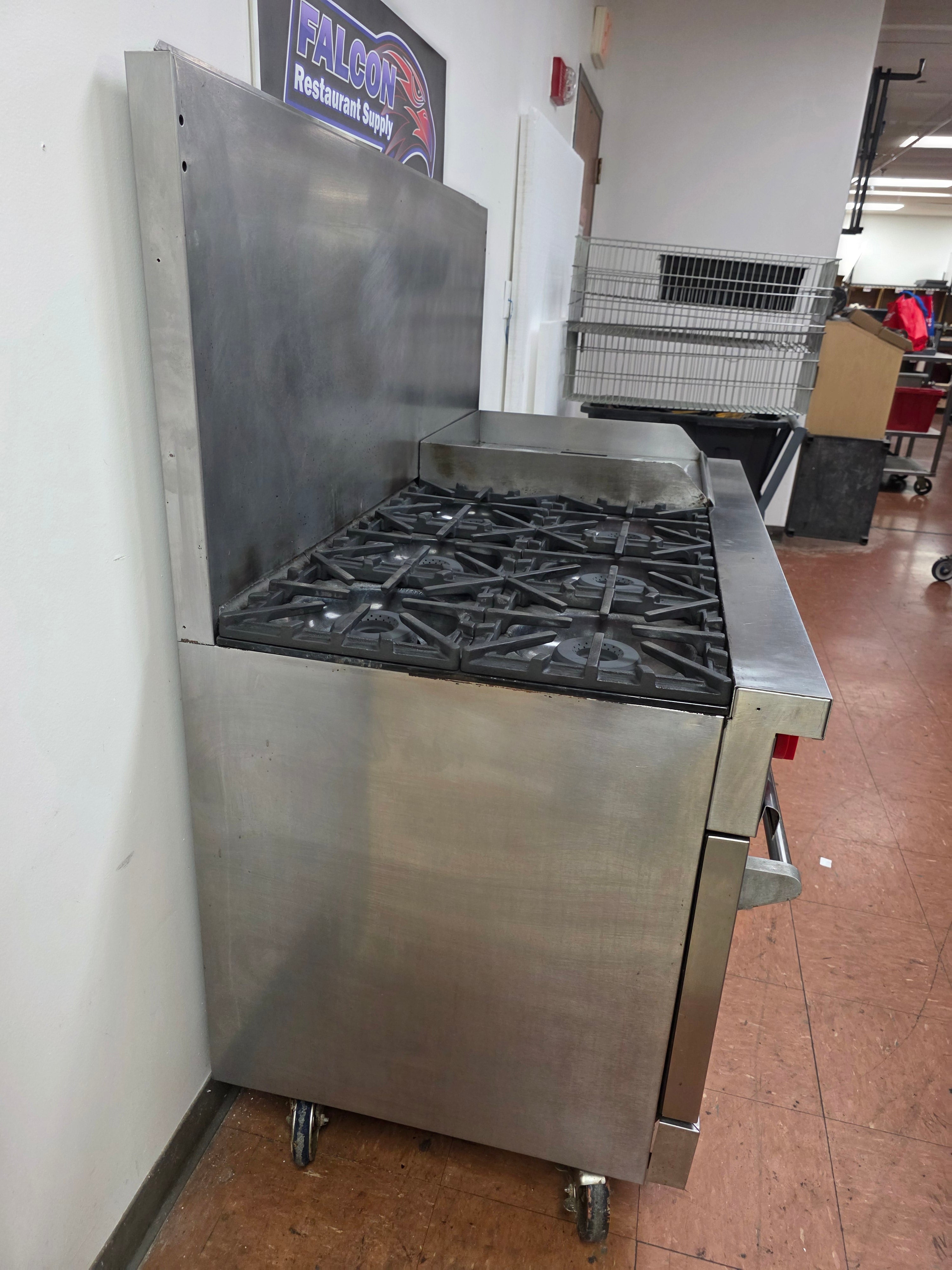 Used Vulcan 60-FTL 6 Burner NG Range with 24" Griddle and 2 Ovens