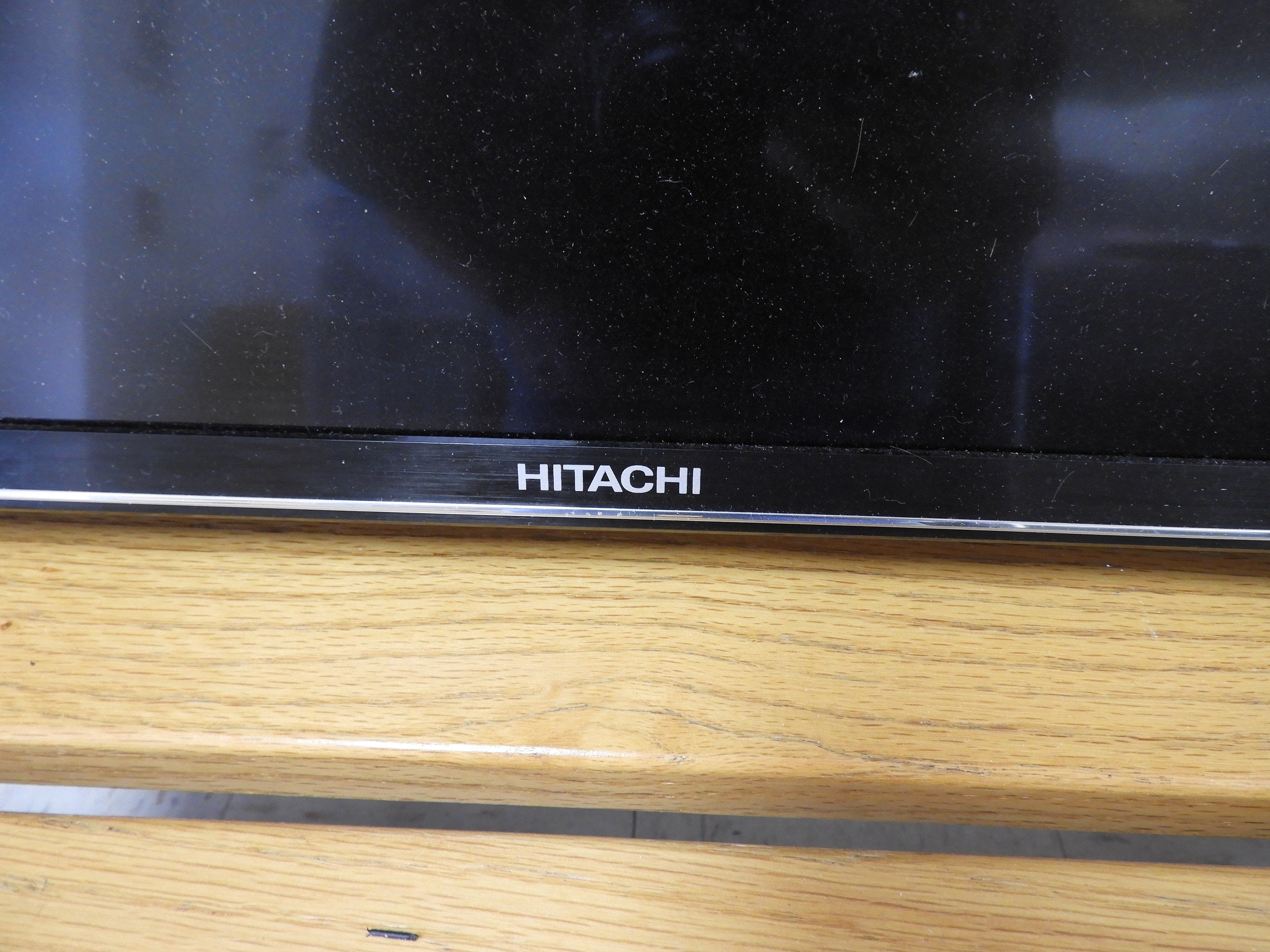 Used 42" Hitachi Roku TV with Wall Mount