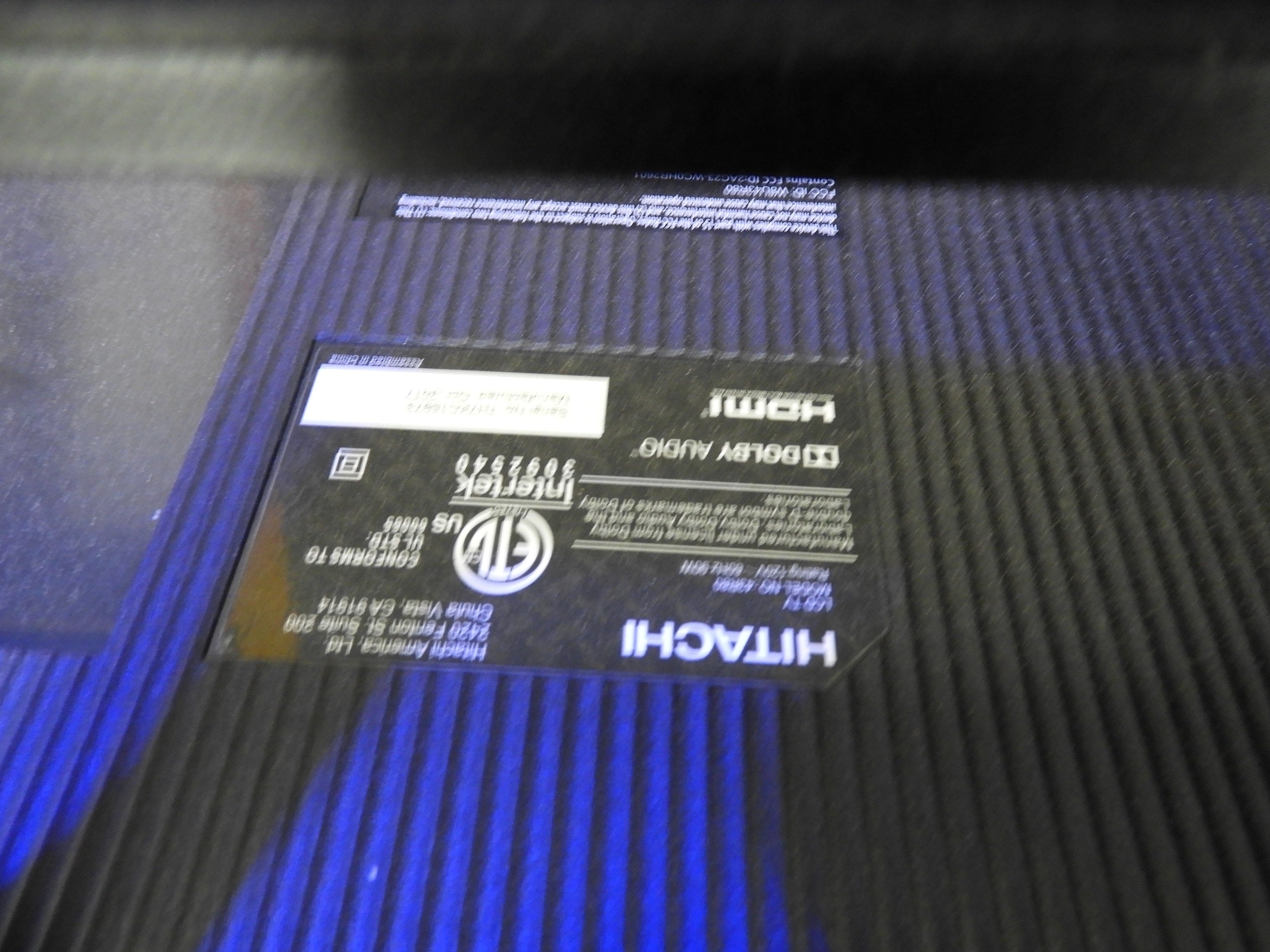 Used 42" Hitachi Roku TV with Wall Mount