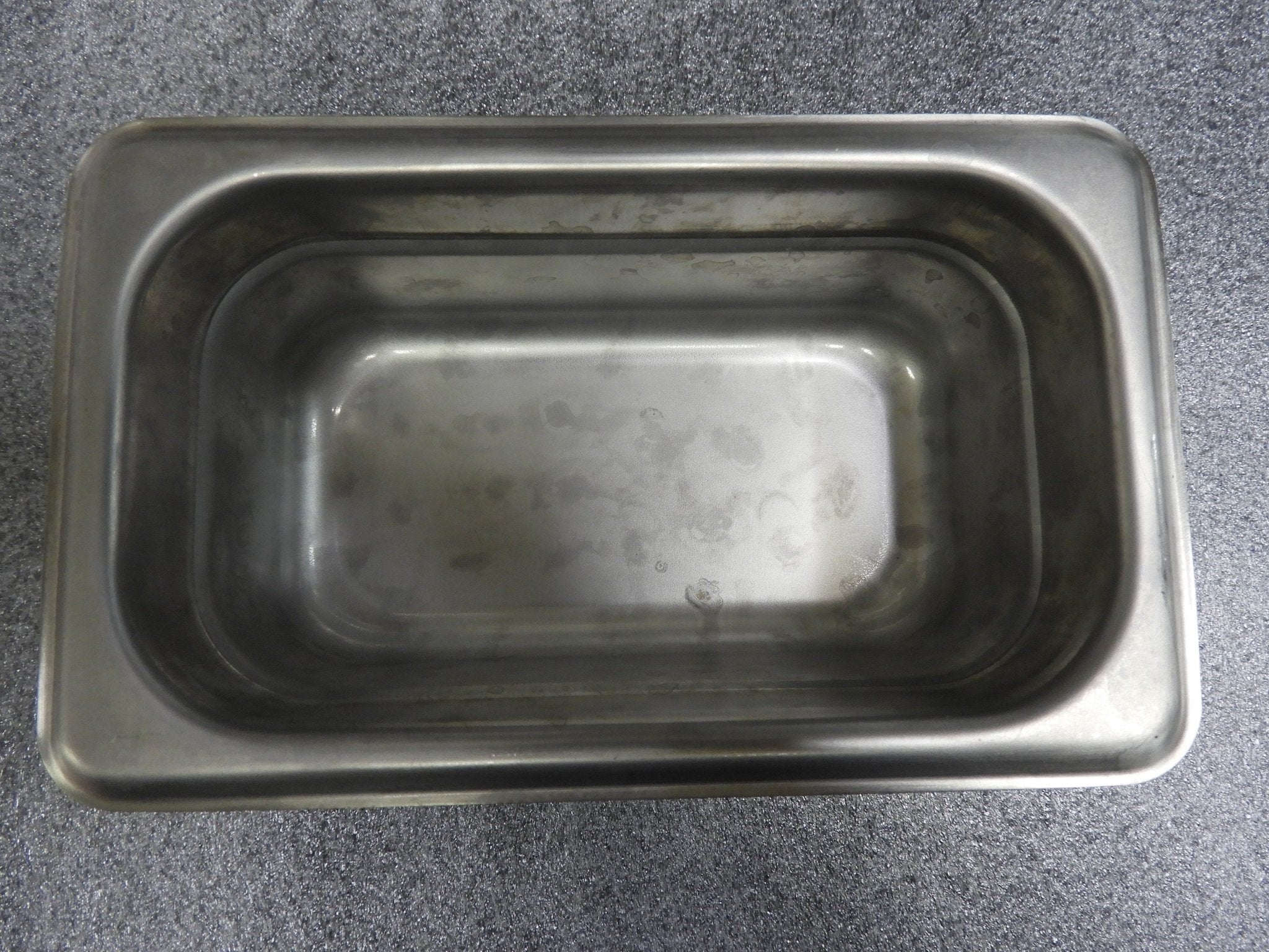 Used Winco SPJL - 902 1/9 Size Anti - Jam Stainless Steel Steam Table Food Pan C IP - Falcon Restaurant Supply - 1