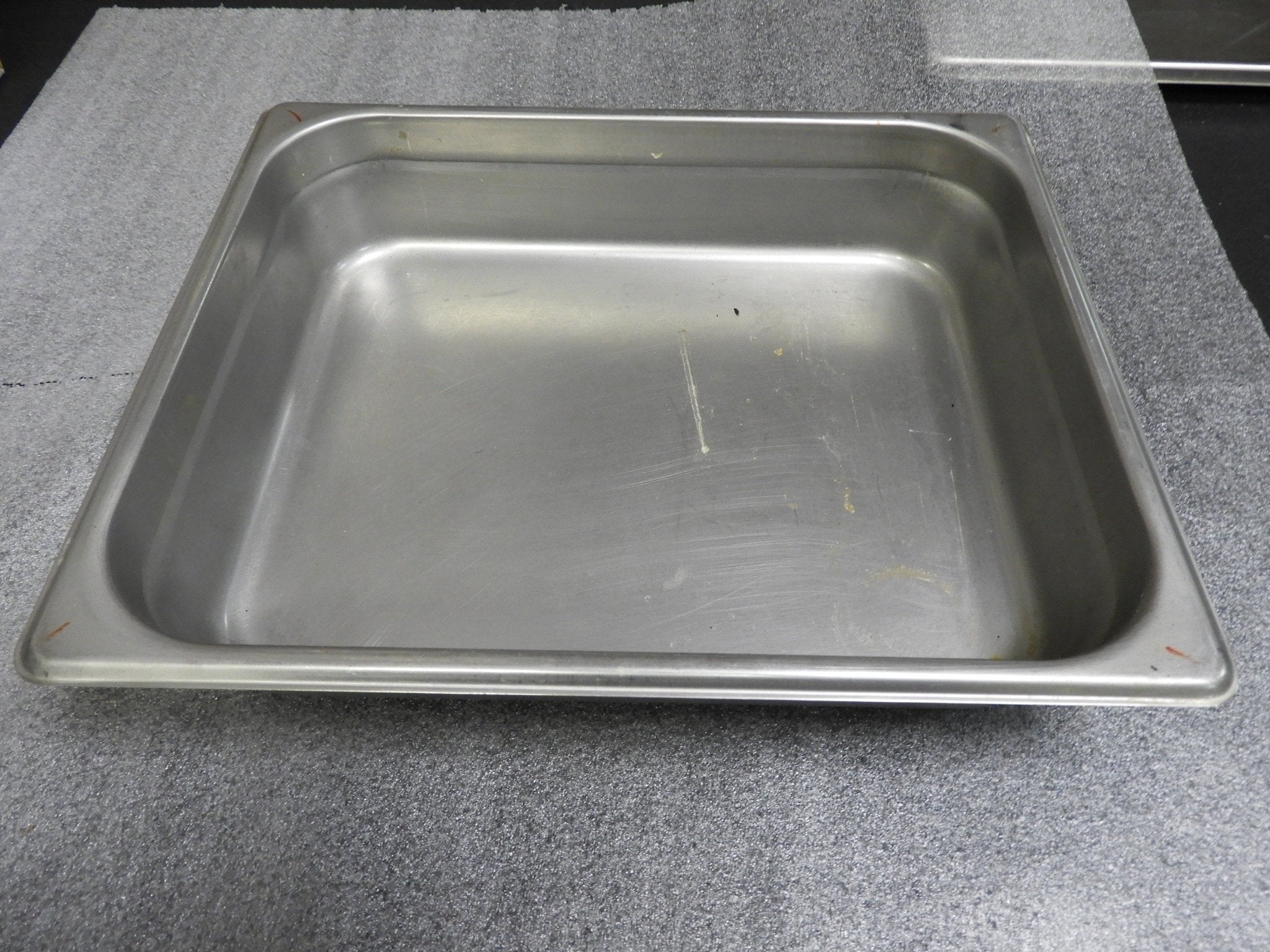 Used Choice 1/2 Size 2 1/2" Deep Anti - Jam Stainless Steel Steam Table Pan C IP - Falcon Restaurant Supply - 1