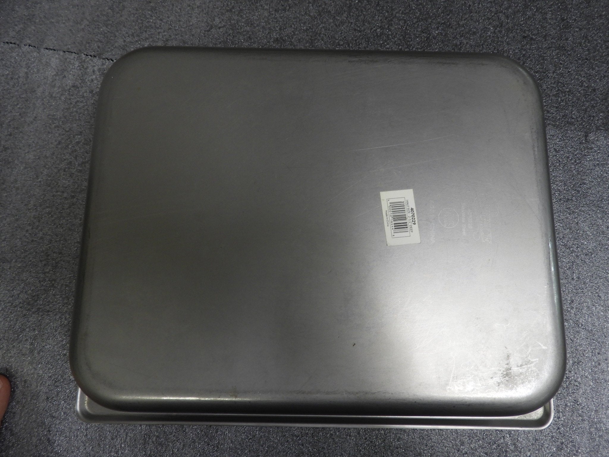 Used Choice 1/2 Size 2 1/2" Deep Anti - Jam Stainless Steel Steam Table Pan C IP - Falcon Restaurant Supply - 3