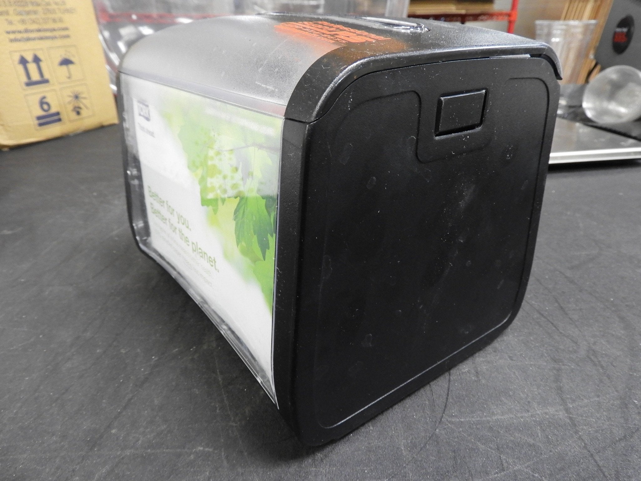 Used Tork Xpressnap Tabletop Napkin Dispenser, 7.9"W x 5.9"D x 6.1"H, Black C IP - Falcon Restaurant Supply - 3