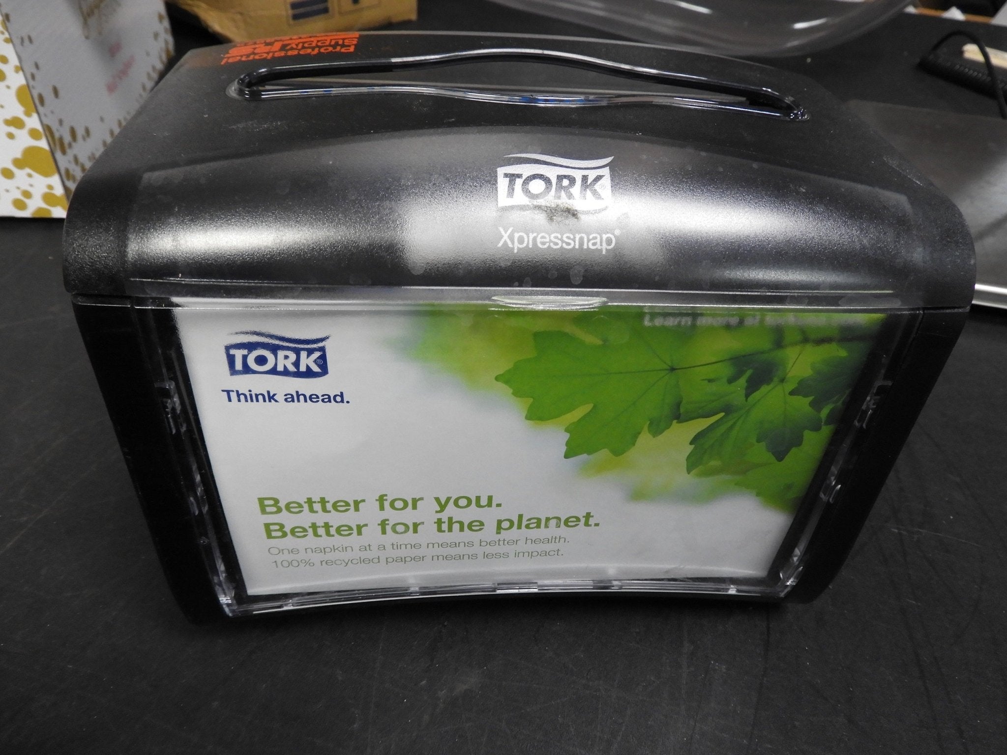 Used Tork Xpressnap Tabletop Napkin Dispenser, 7.9"W x 5.9"D x 6.1"H, Black C IP - Falcon Restaurant Supply - 4