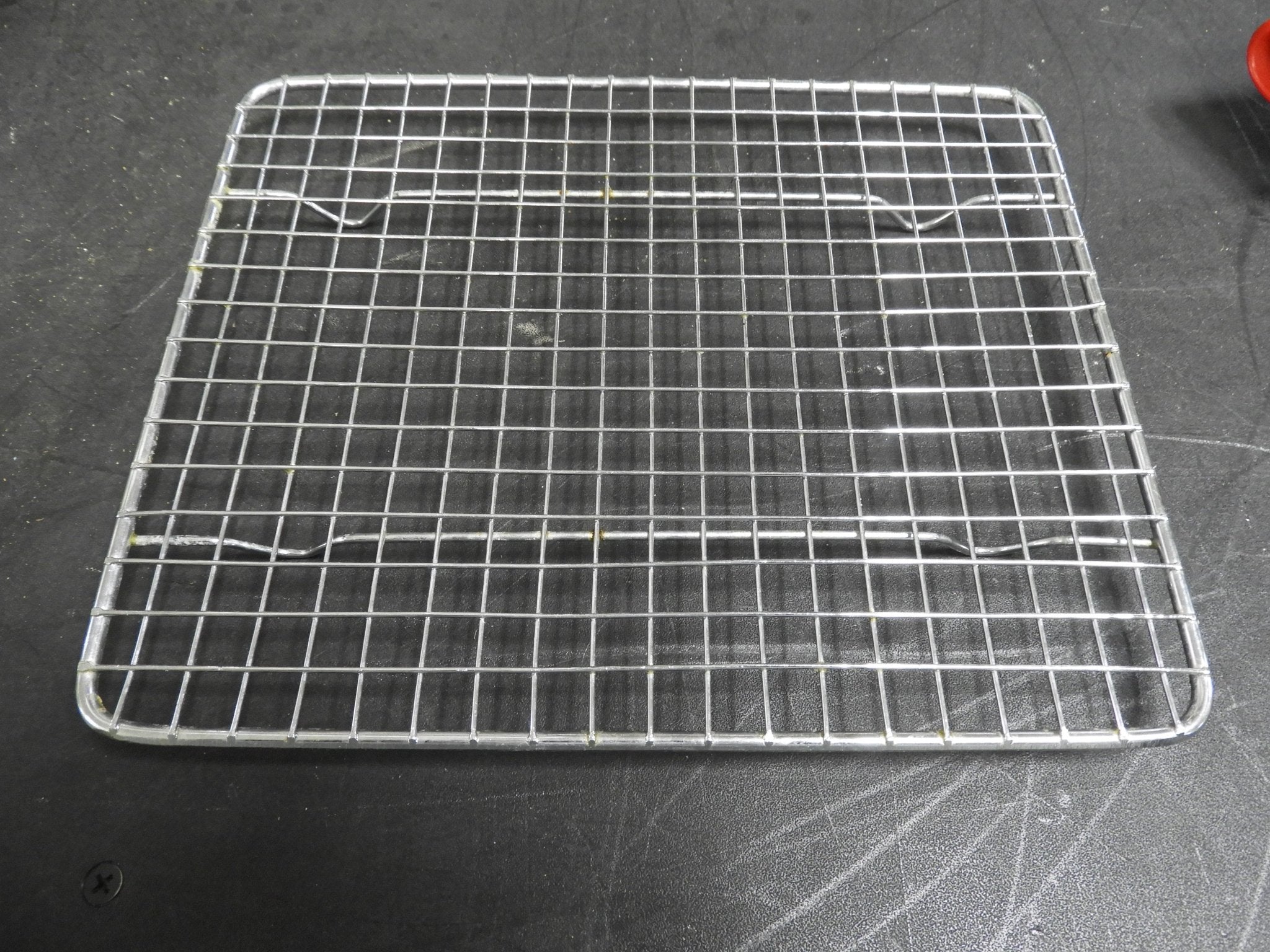 Used Winco PGW - 810 8" x 10" Half - Size Footed Chrome Plated Steel Wire Cooling Rack / Pan Grate C IP - Falcon Restaurant Supply - 2