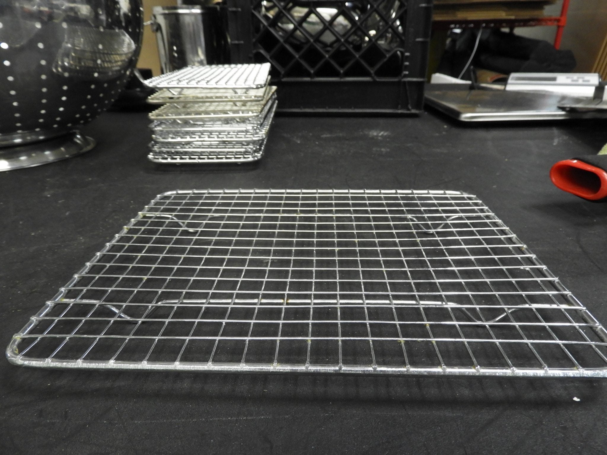 Used Winco PGW - 810 8" x 10" Half - Size Footed Chrome Plated Steel Wire Cooling Rack / Pan Grate C IP - Falcon Restaurant Supply - 3