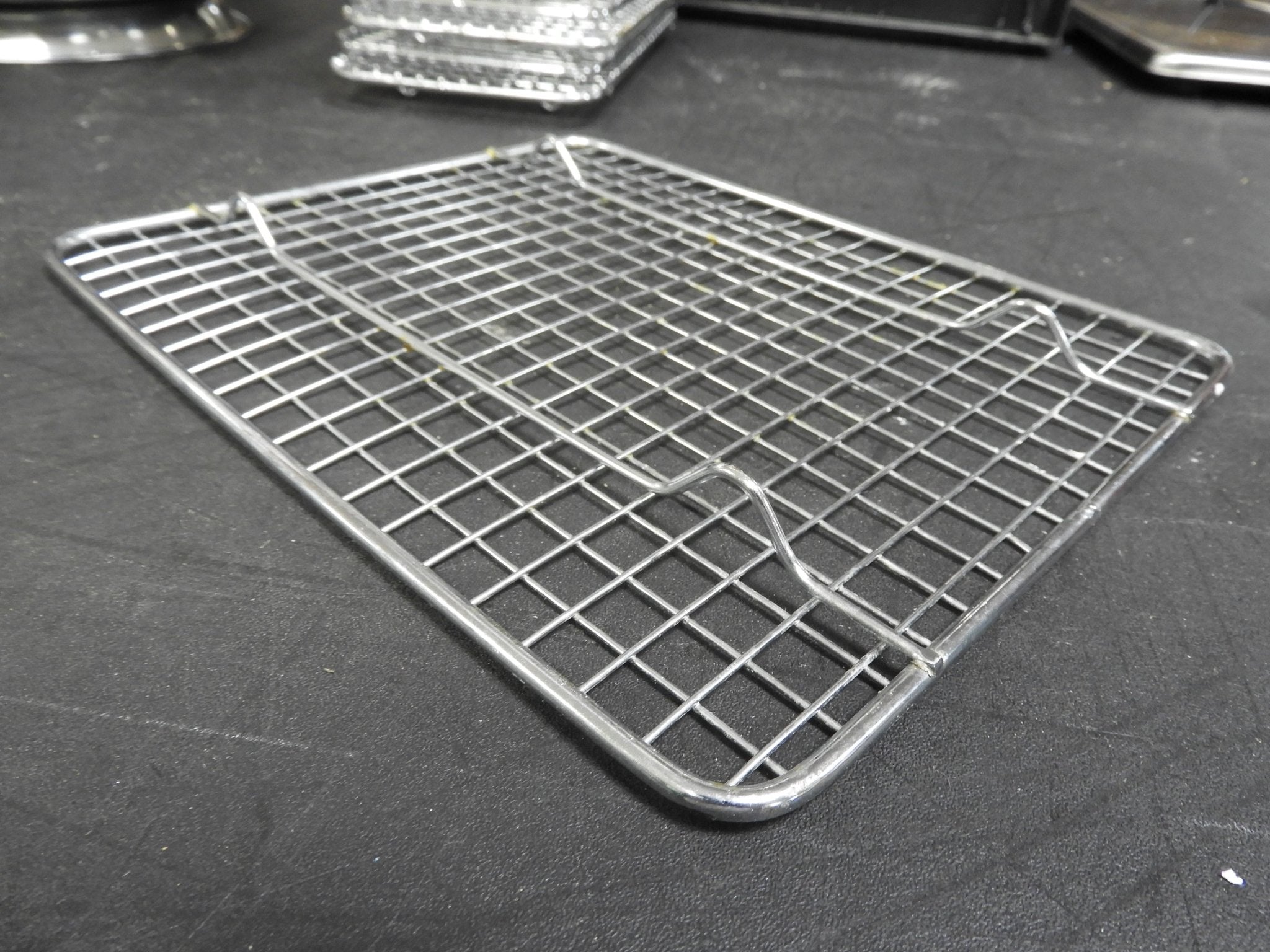 Used Winco PGW - 810 8" x 10" Half - Size Footed Chrome Plated Steel Wire Cooling Rack / Pan Grate C IP - Falcon Restaurant Supply - 4