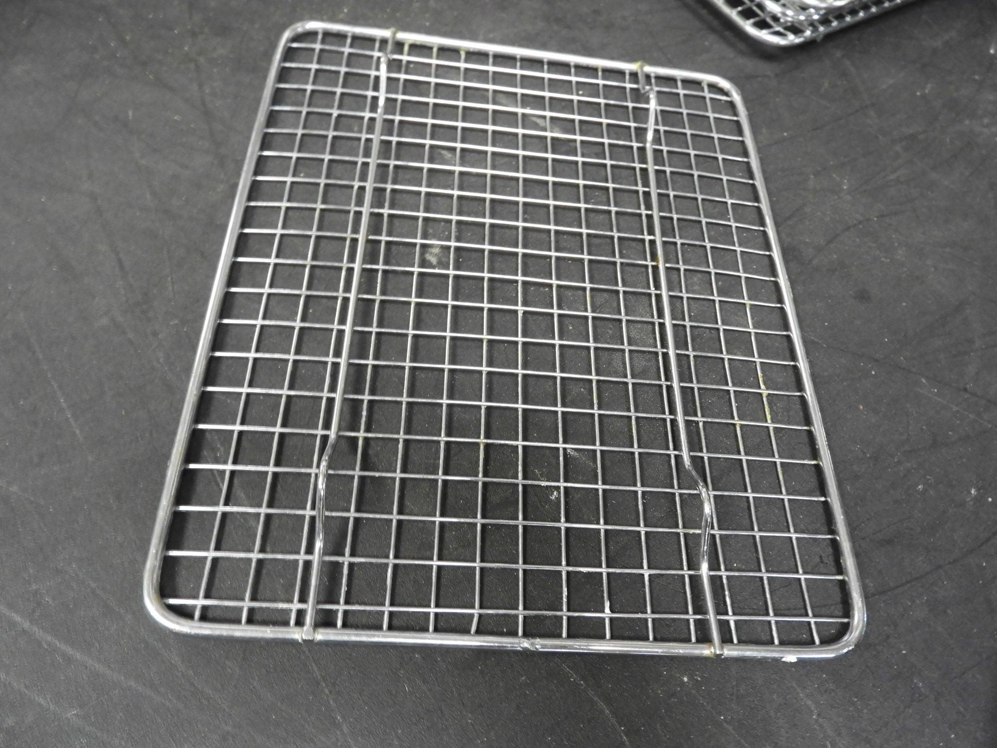 Used Winco PGW - 810 8" x 10" Half - Size Footed Chrome Plated Steel Wire Cooling Rack / Pan Grate C IP - Falcon Restaurant Supply - 1