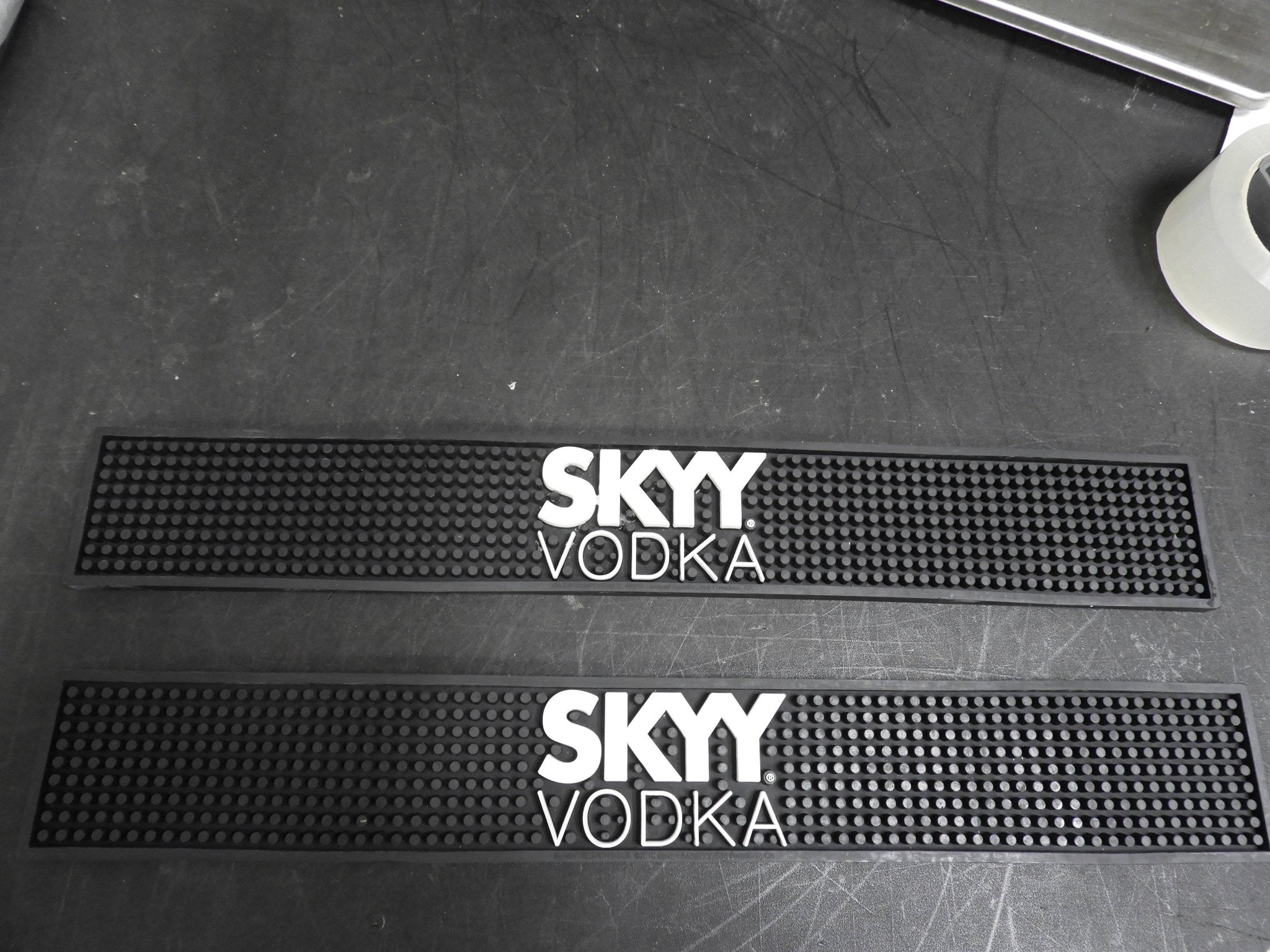 Used One Skyy Vodka Bar Mat Spill Mat Rail Beer Tap Mat 22.5"x3.25"x7/16" - Falcon Restaurant Supply - 1
