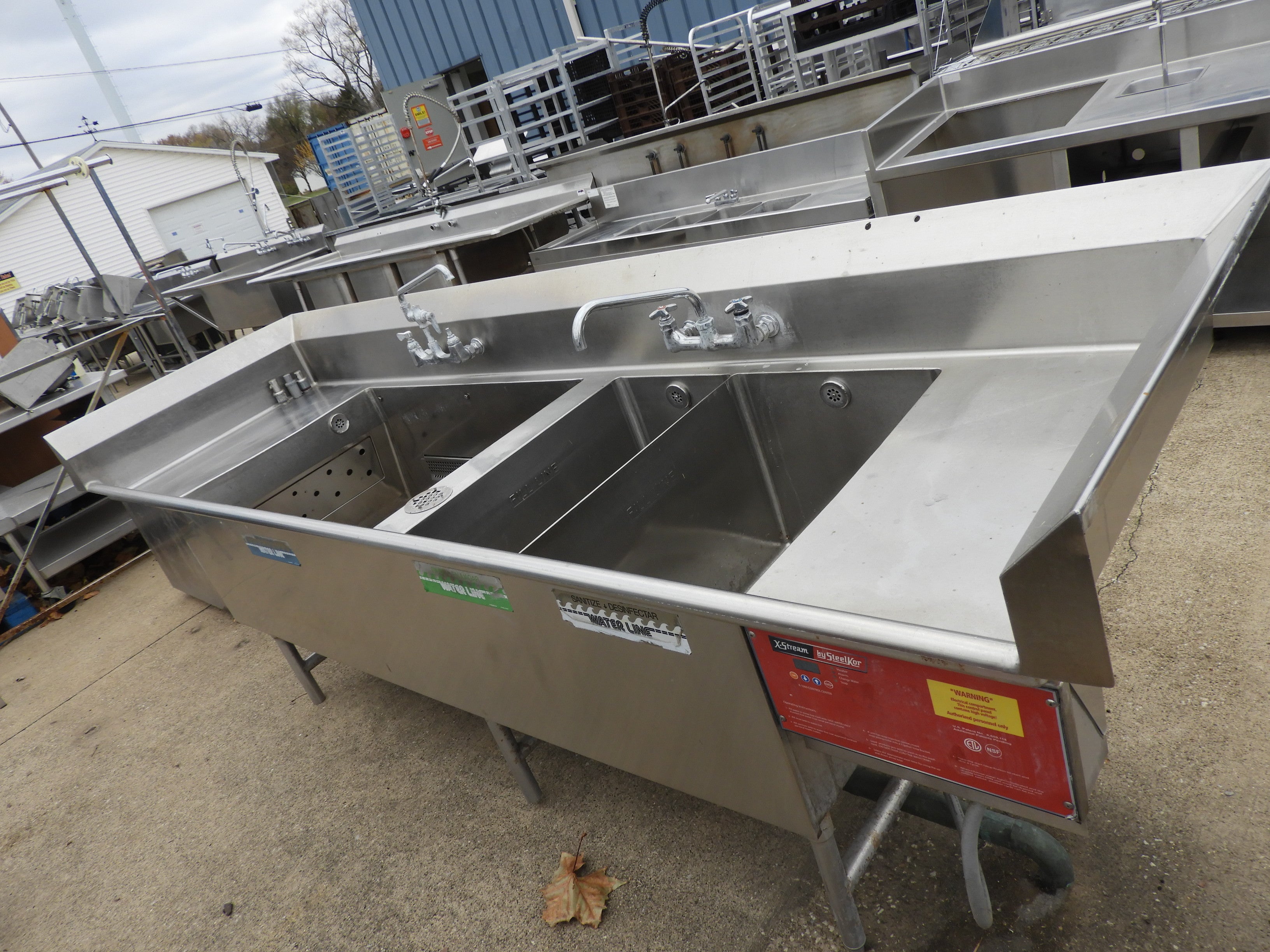 Used 3 Compartment Stainless Steel Commercial Sink with Twist Drains and X-Stream Wash - SS18