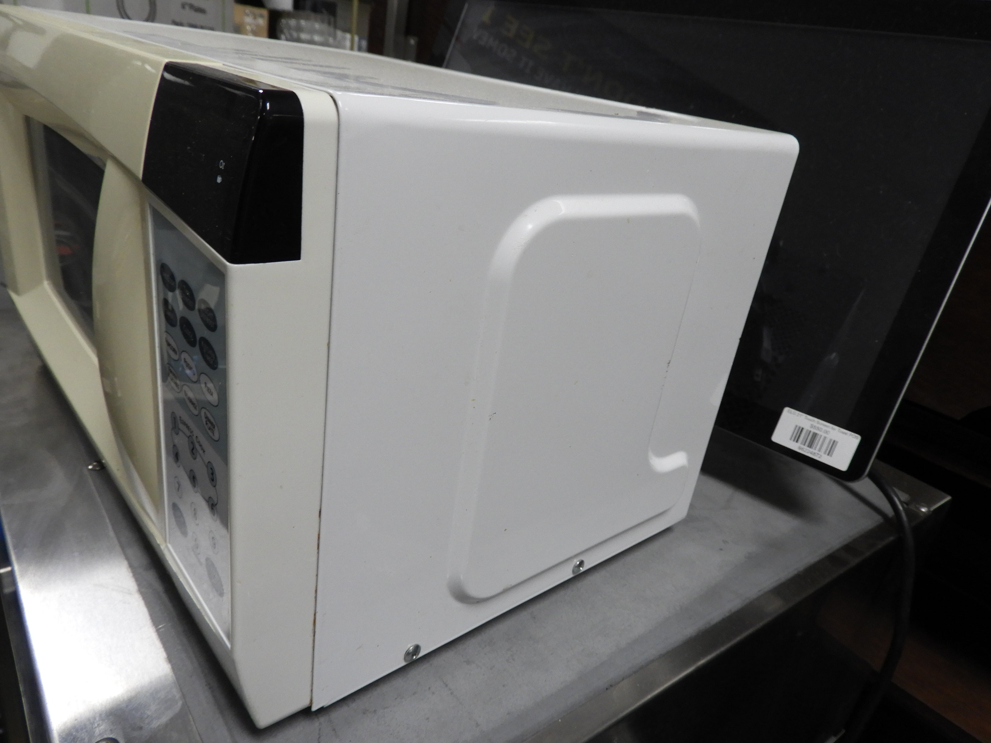 Used Emerson 700 Watt 0.7 Cubic Feet Microwave Oven MW7300W 120V - Falcon Restaurant Supply - 5