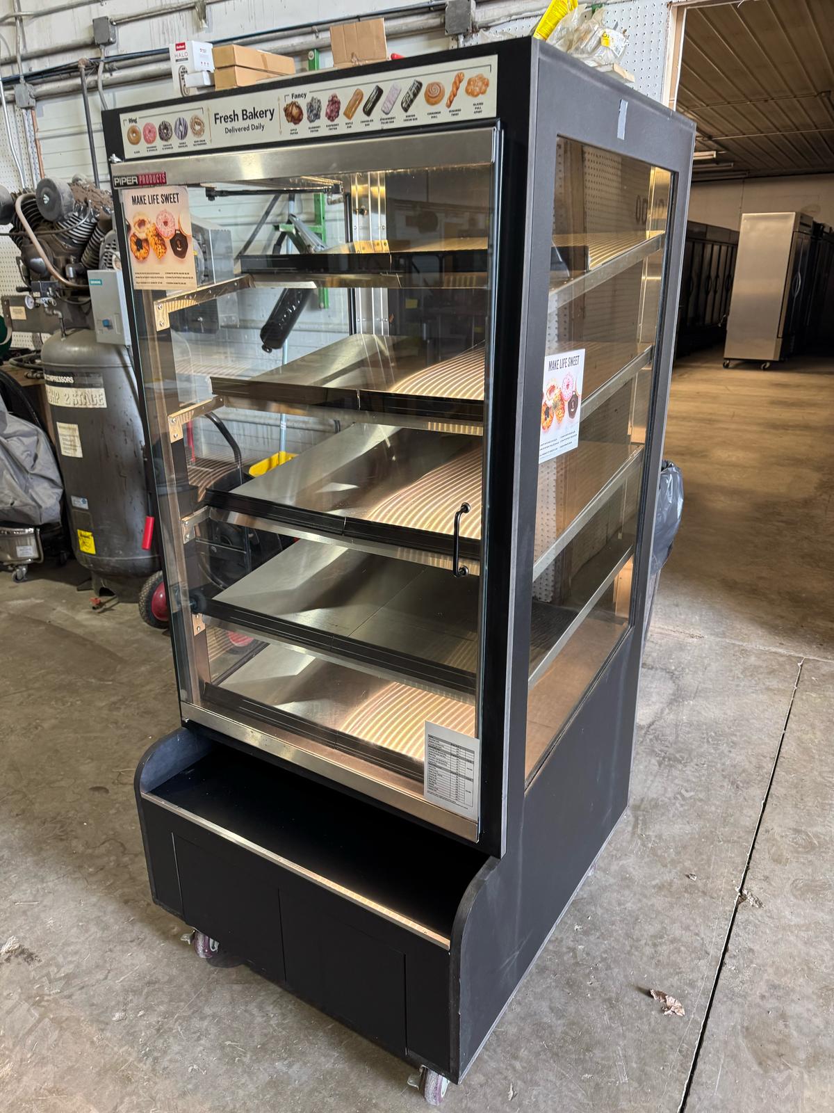 Used Piper TFC - L5 Bakery Display Case Merchandiser with LED Lights and Casters 120V - Falcon Restaurant Supply - 3