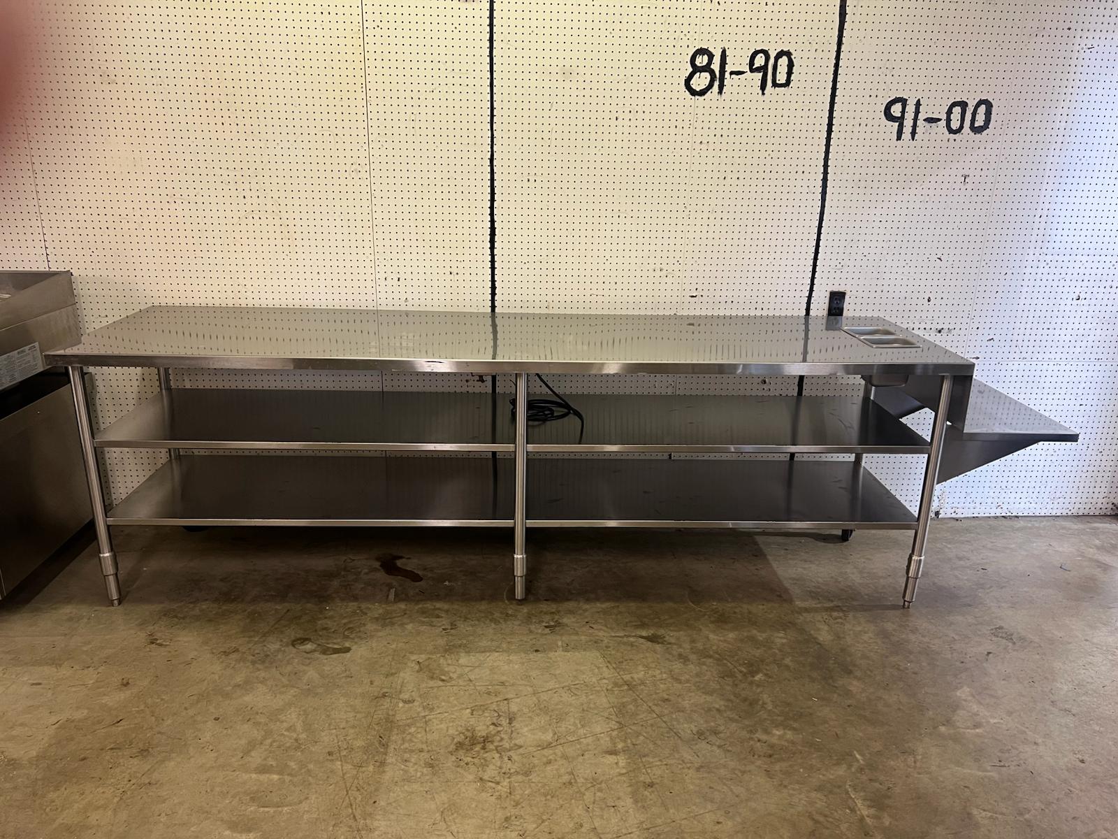 Used 128" Heated Top Stainless Steel Table with Step Down Shelf - FG - Falcon Restaurant Supply - 1