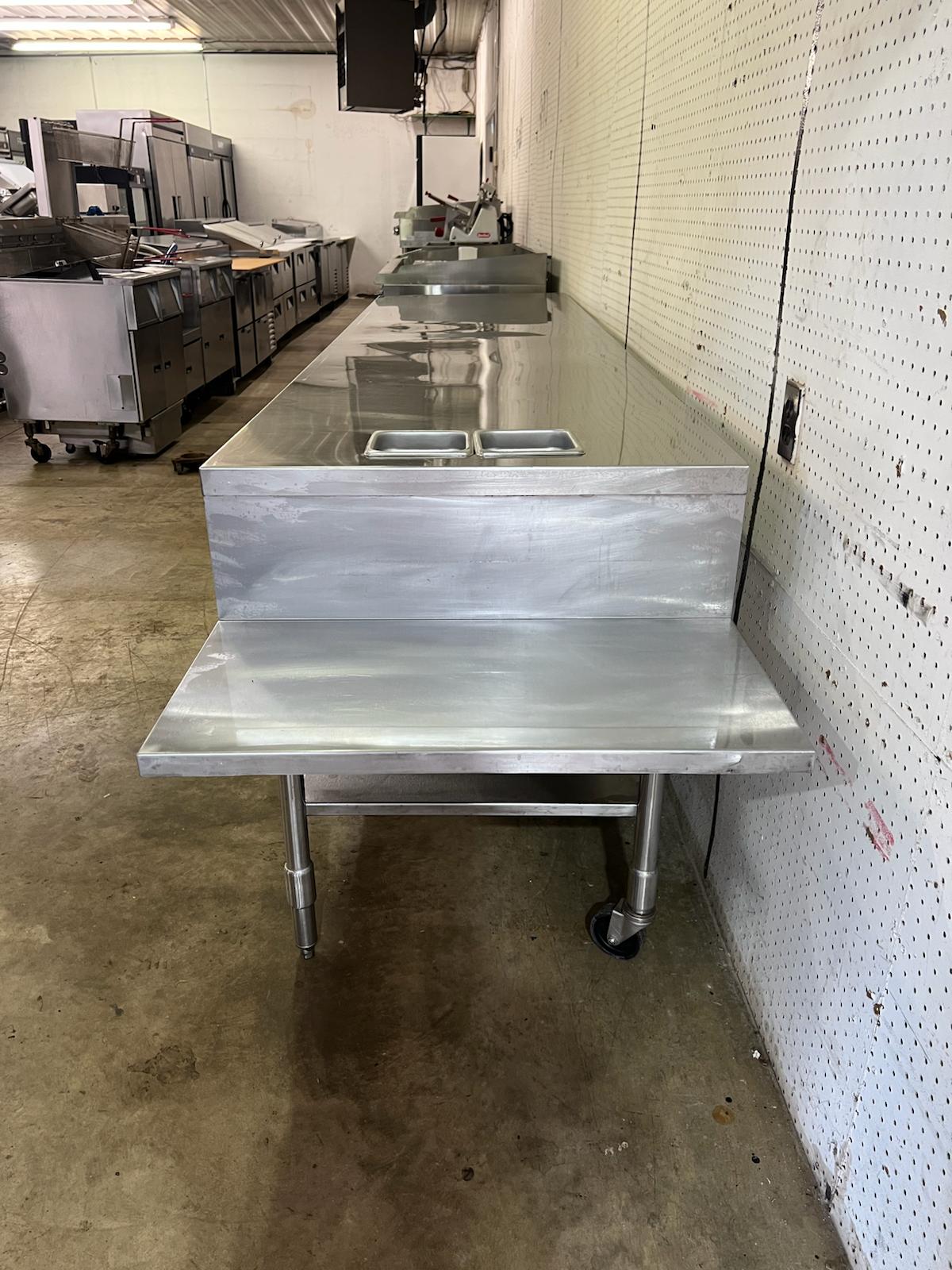 Used 128" Heated Top Stainless Steel Table with Step Down Shelf - FG - Falcon Restaurant Supply - 4