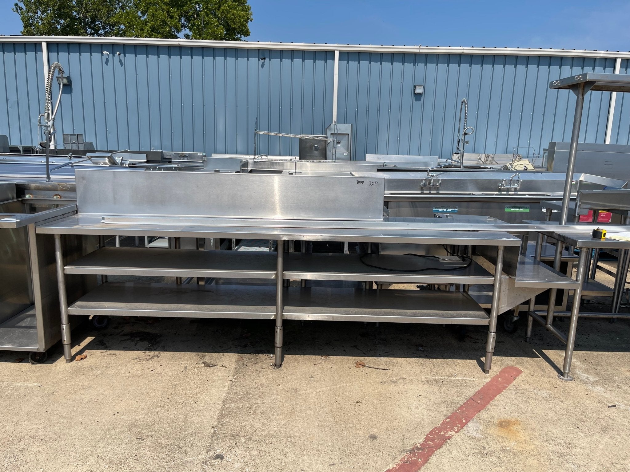 Used 128" Stainless Steel Table Counter with Shelves - SS238 - Falcon Restaurant Supply - 1