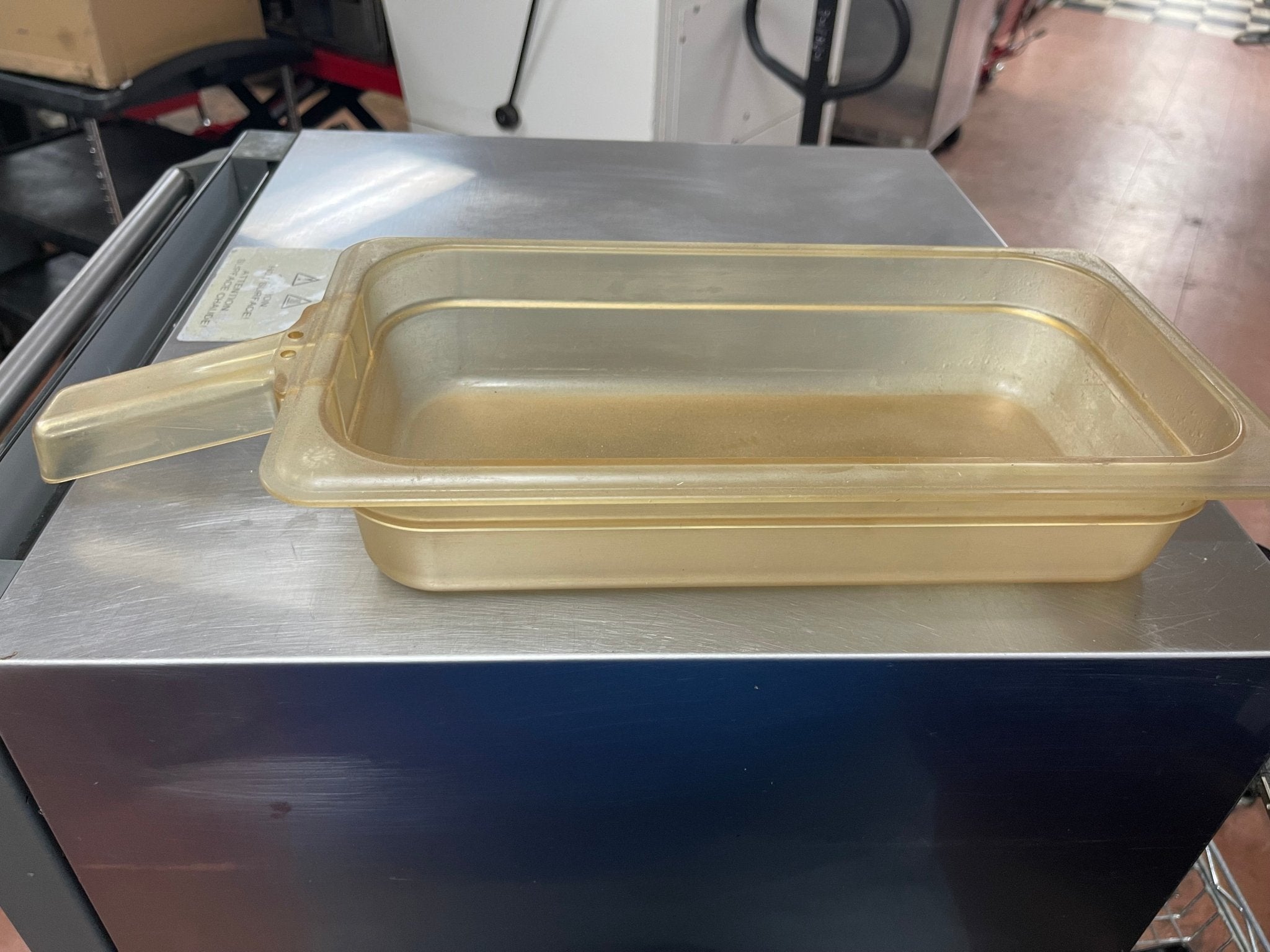 Used 1/3 Size Amber High Heat Plastic Food Pan with Handle - 2 1/2" Deep - Falcon Restaurant Supply - 1