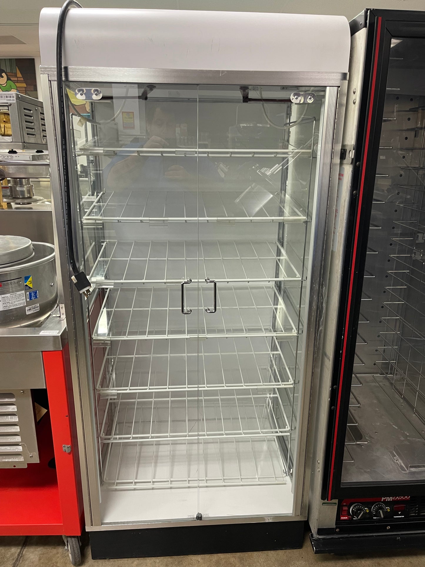 Used 70"H Self Closing Glass 2 Door Lighted Display Case 120V