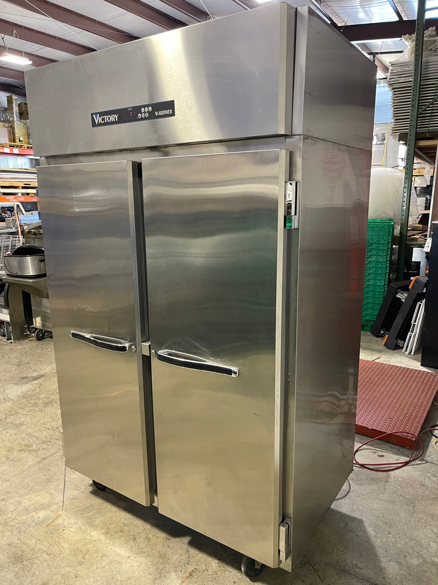 Used Victory VF - SA - 2D 52" Top Mounted Double Solid Door Reach - In Freezer 115V - Falcon Restaurant Supply - 4