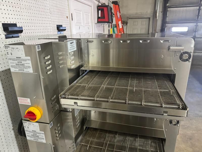 Used Double Stack of Ovention Commercial Conveyor C2000 Pizza Ovens with stand, 220V Single Phase JS