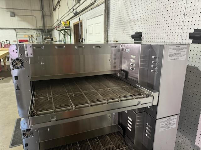 Used Double Stack of Ovention Commercial Conveyor C2000 Pizza Ovens with stand, 220V Single Phase JS