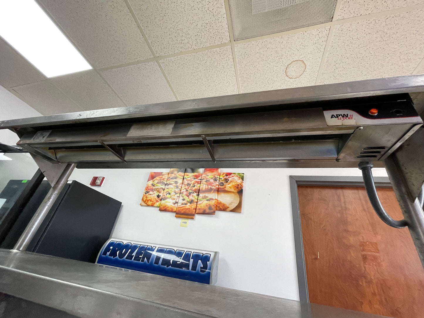 Used 108" Stainless Steel Table with Shelves and Strip Food Warmers - SS286