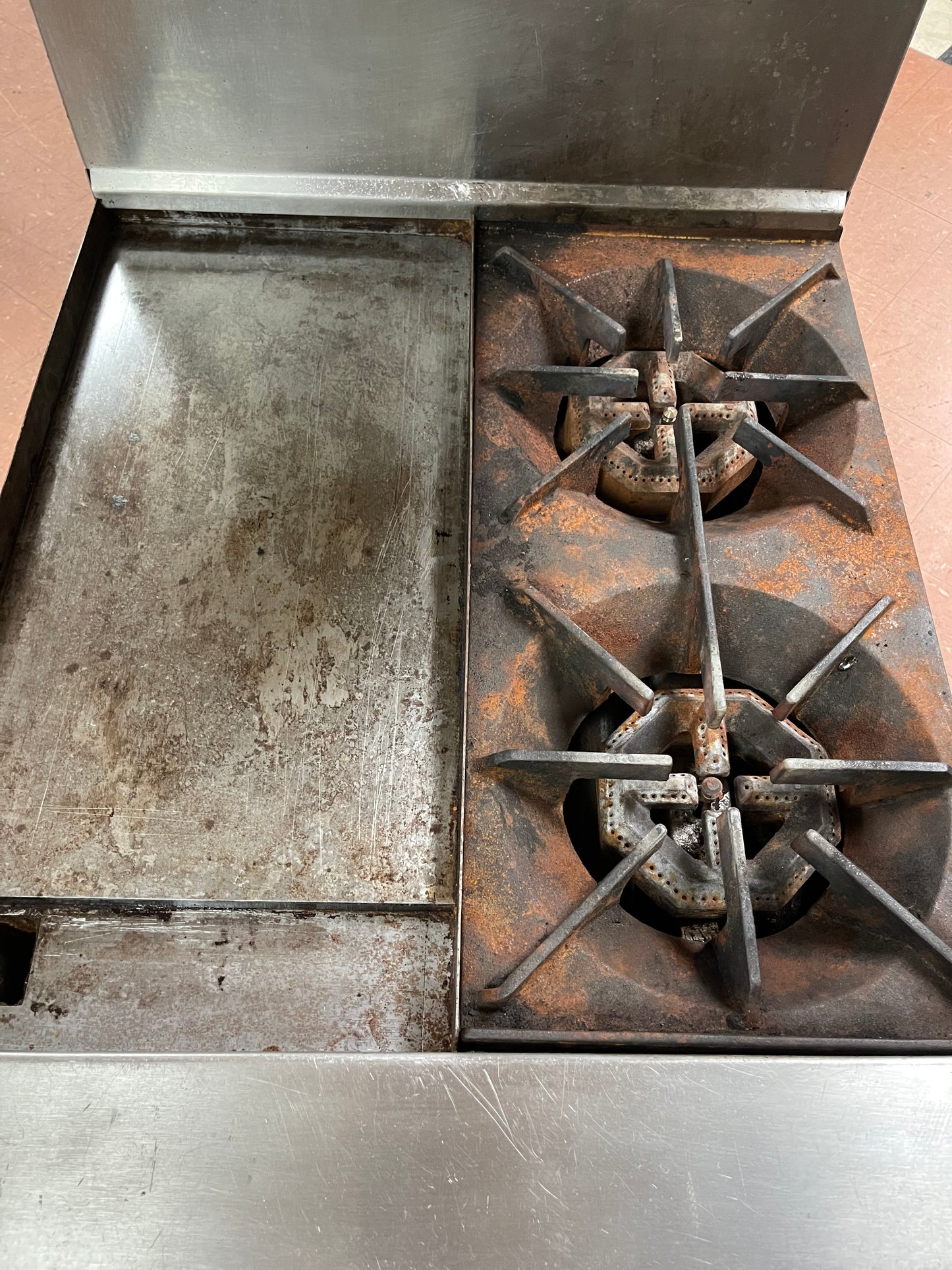 Used U.S. Range Natural Gas 2 Burner 24" Range with 12" Flat Top Griddle and Oven