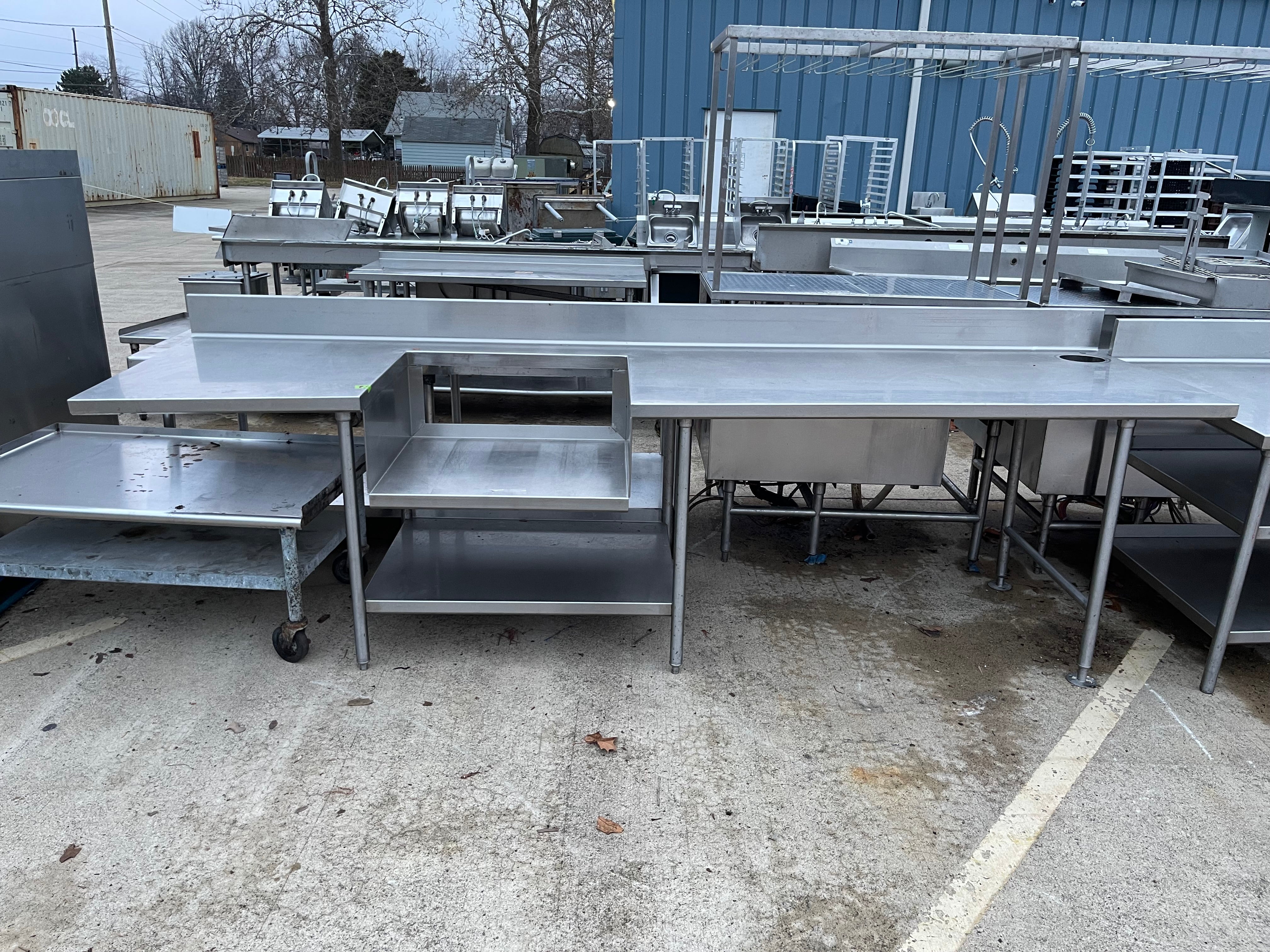 Used 130" Stainless Steel Table with Shelves and Small Sink Area - SS13