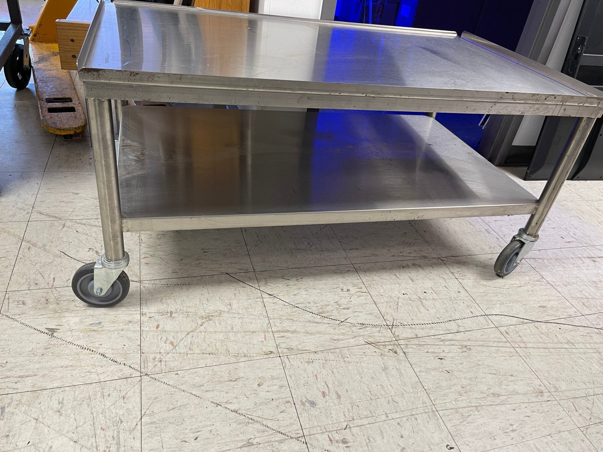 Used 48.5"x29"x23" Stainless Steel Equipment Stand with Caster Wheels - Falcon Restaurant Supply - 1