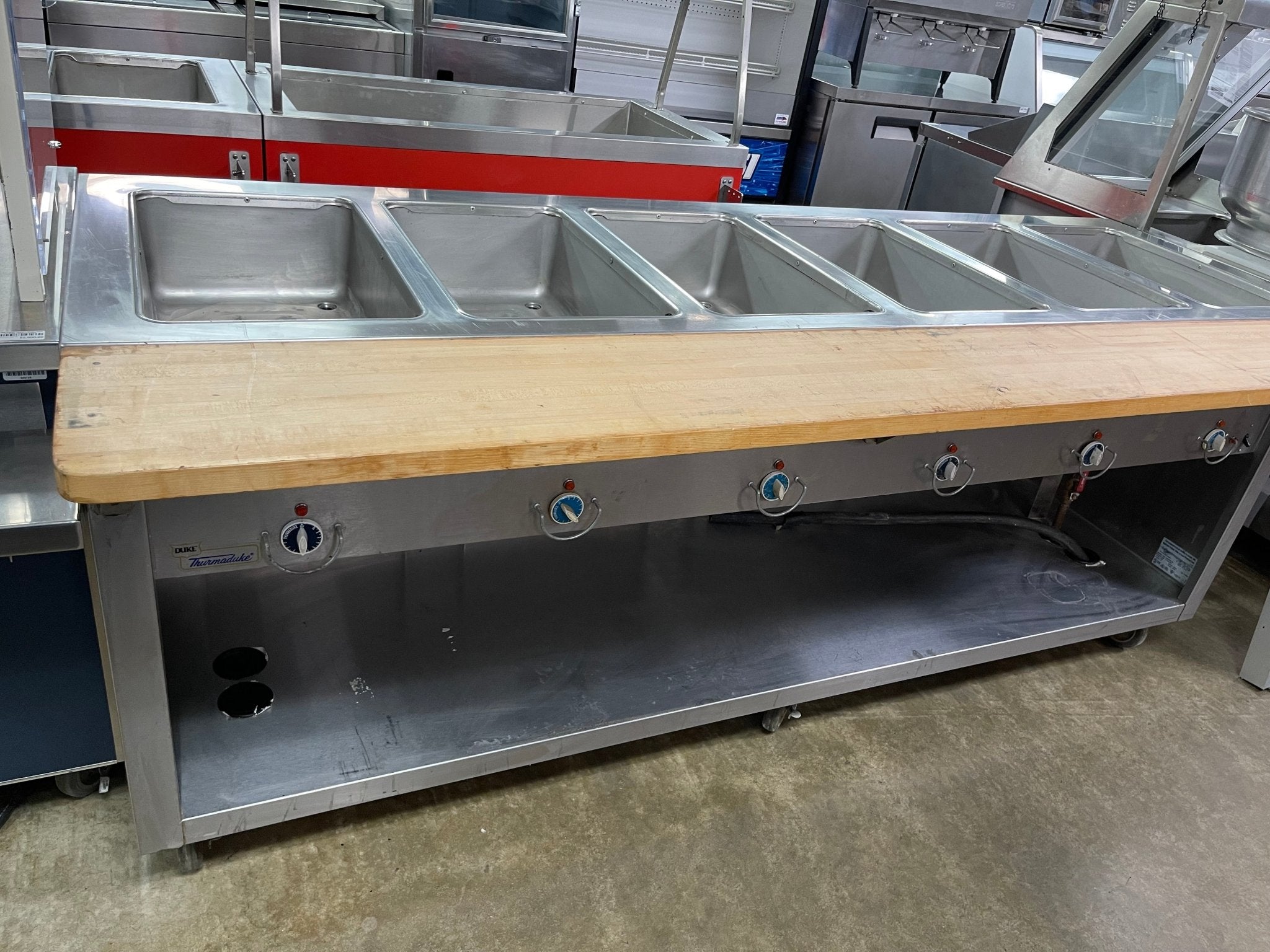 Used Duke E - 6 - CBSS_208/60/1 Thurmaduke Steam Table w/ 6 Wells & Undershelf, 240v - Falcon Restaurant Supply - 6