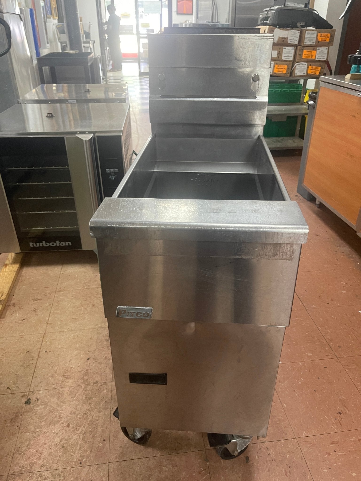 Used Pitco SG14 Natural Gas 40 - 50 lb. Stainless Steel Floor Fryer - 110,000 BTU - Falcon Restaurant Supply - 1