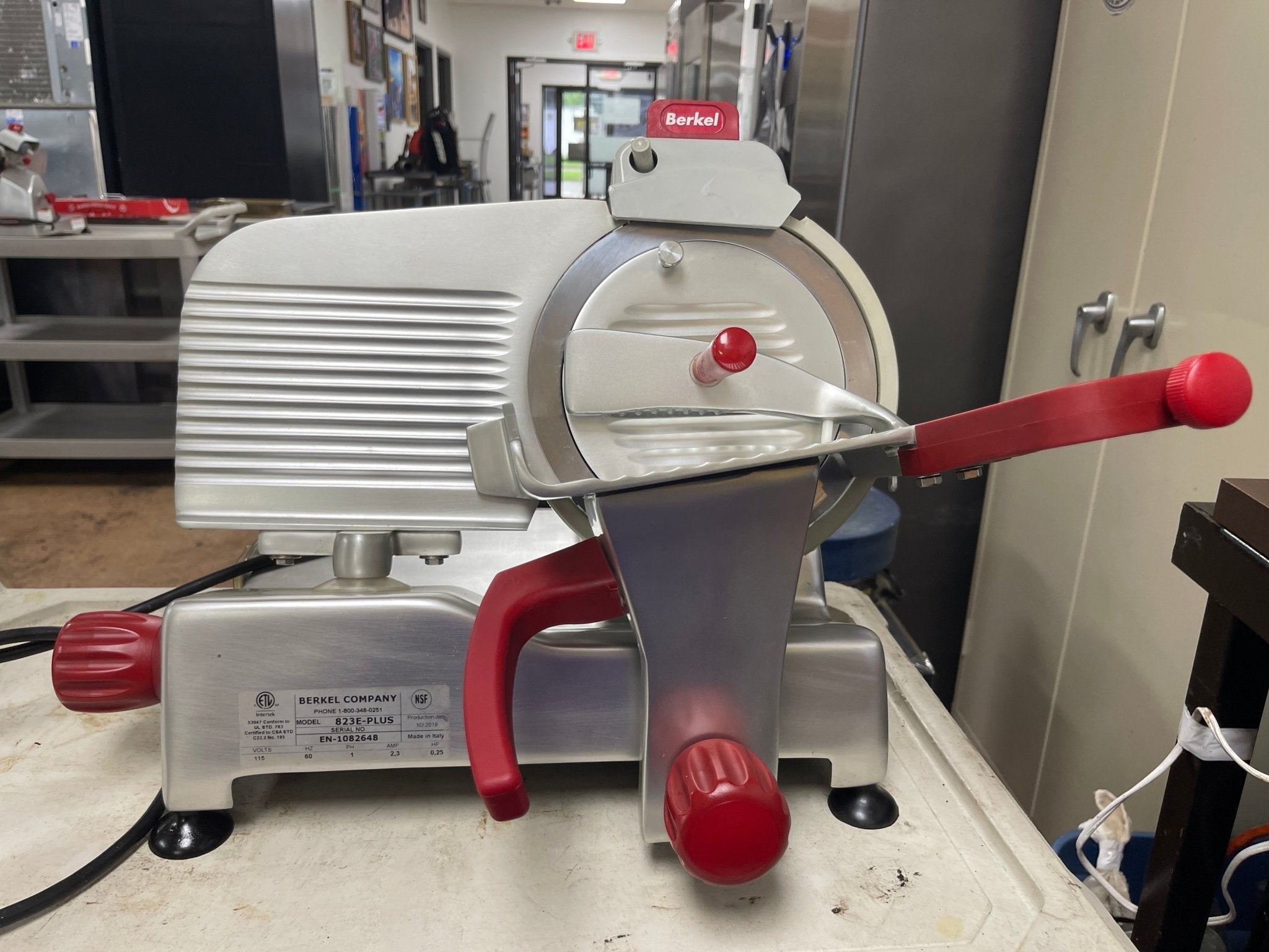 Used Berkel 823E - PLUS 9" Manual Deli Meat Cheese Slicer 120V - Falcon Restaurant Supply - 1