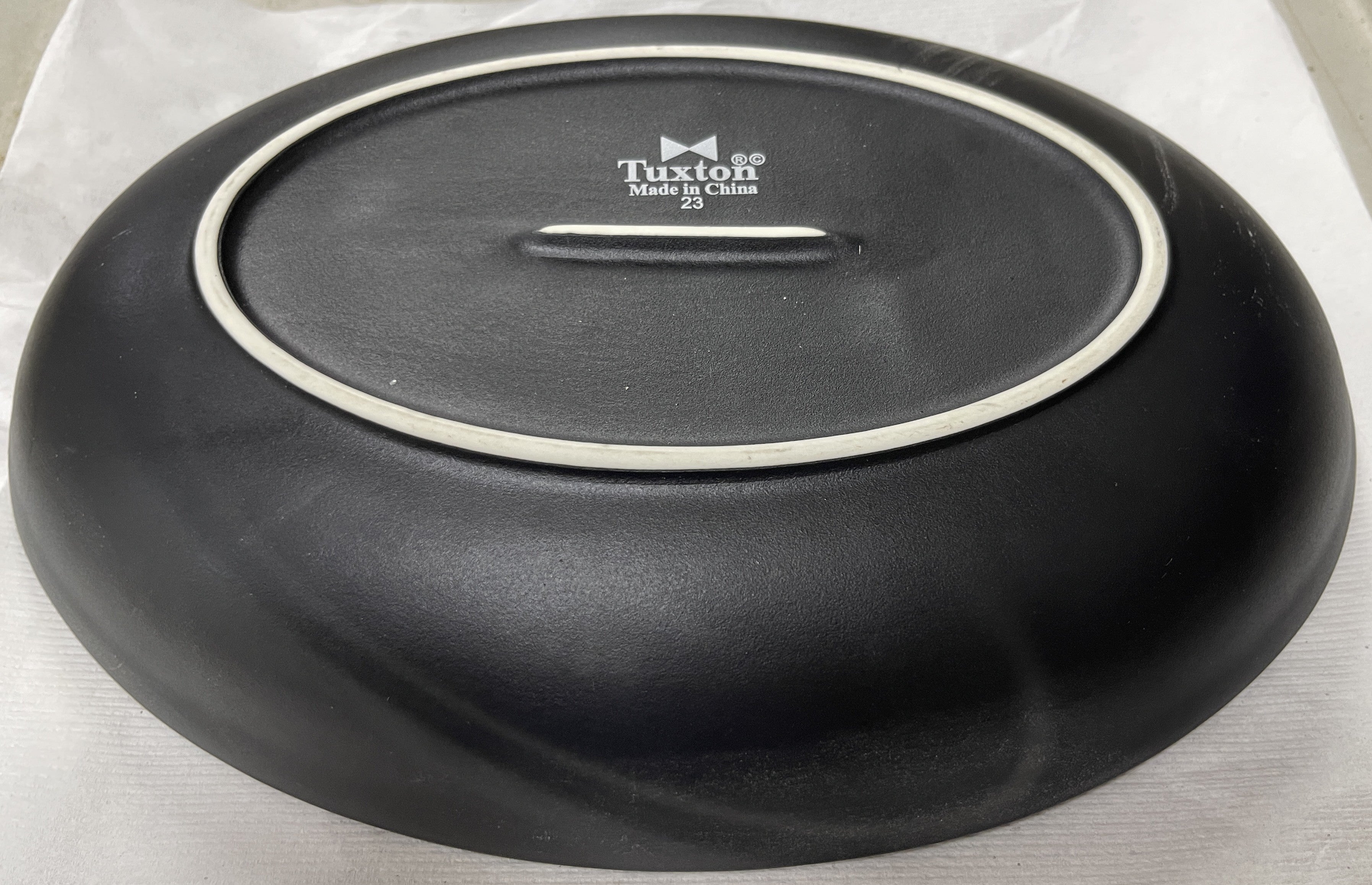 Used Tuxton TuxTrendz Zion Matte Black 35 oz. Embossed Oval China Bowl - WO1