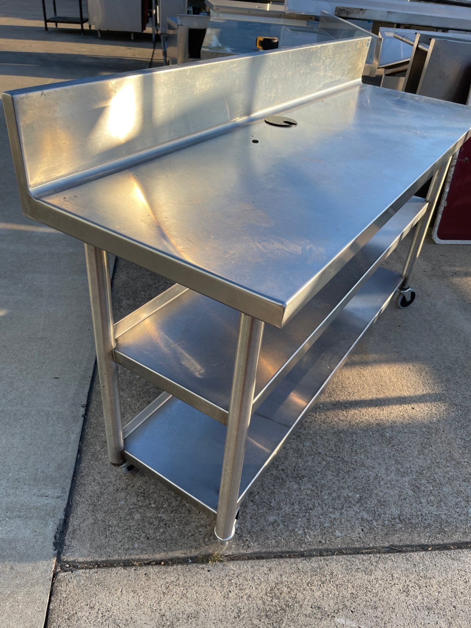 Used 60"x20" Heavy Stainless Table with Shelves, Casters and 6" Backsplash JD - SS323 - Falcon Restaurant Supply - 3