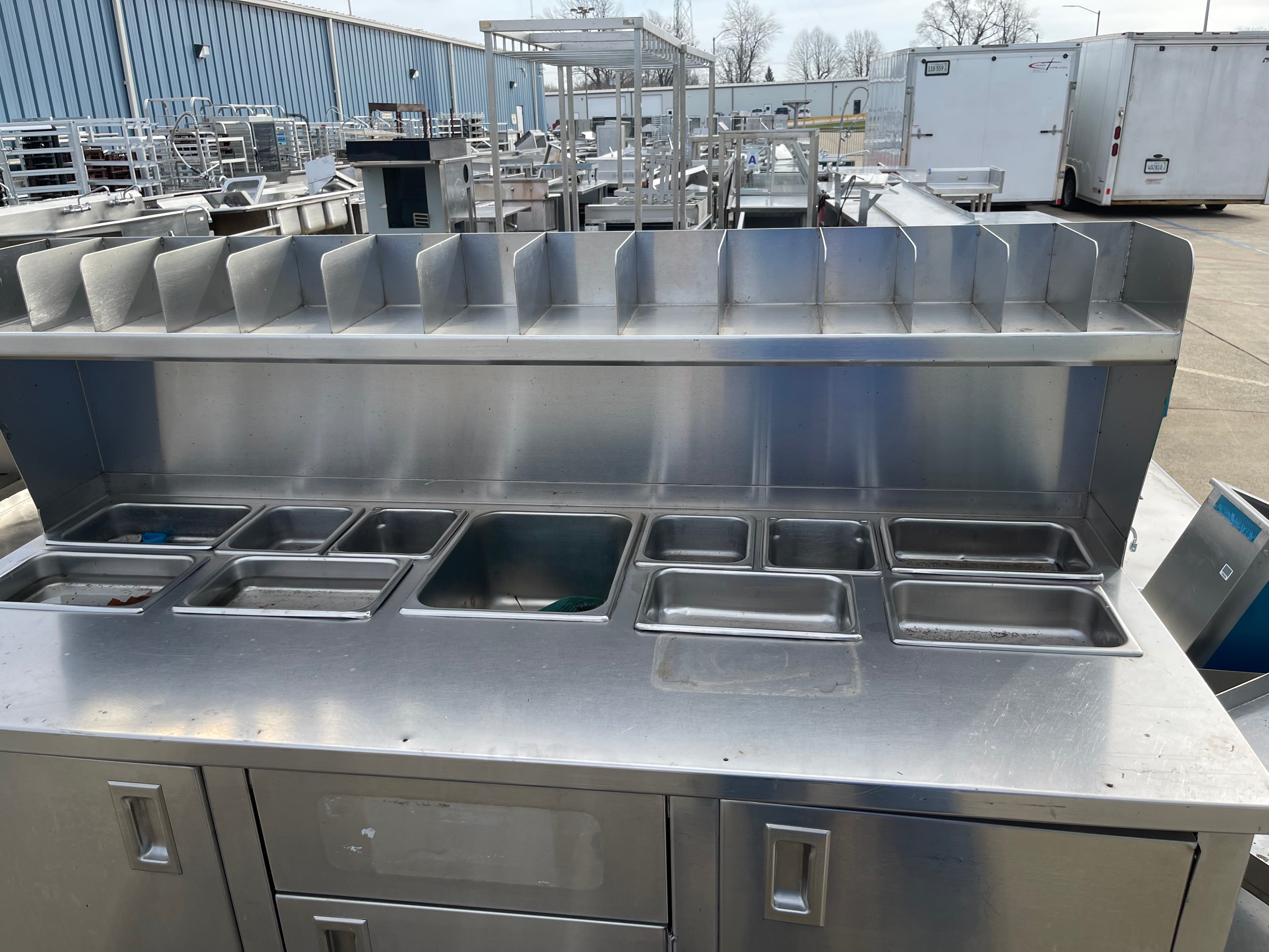 Used 60" Stainless Steel Condiment Station Cabinet with Trash Can Compartment - SS203